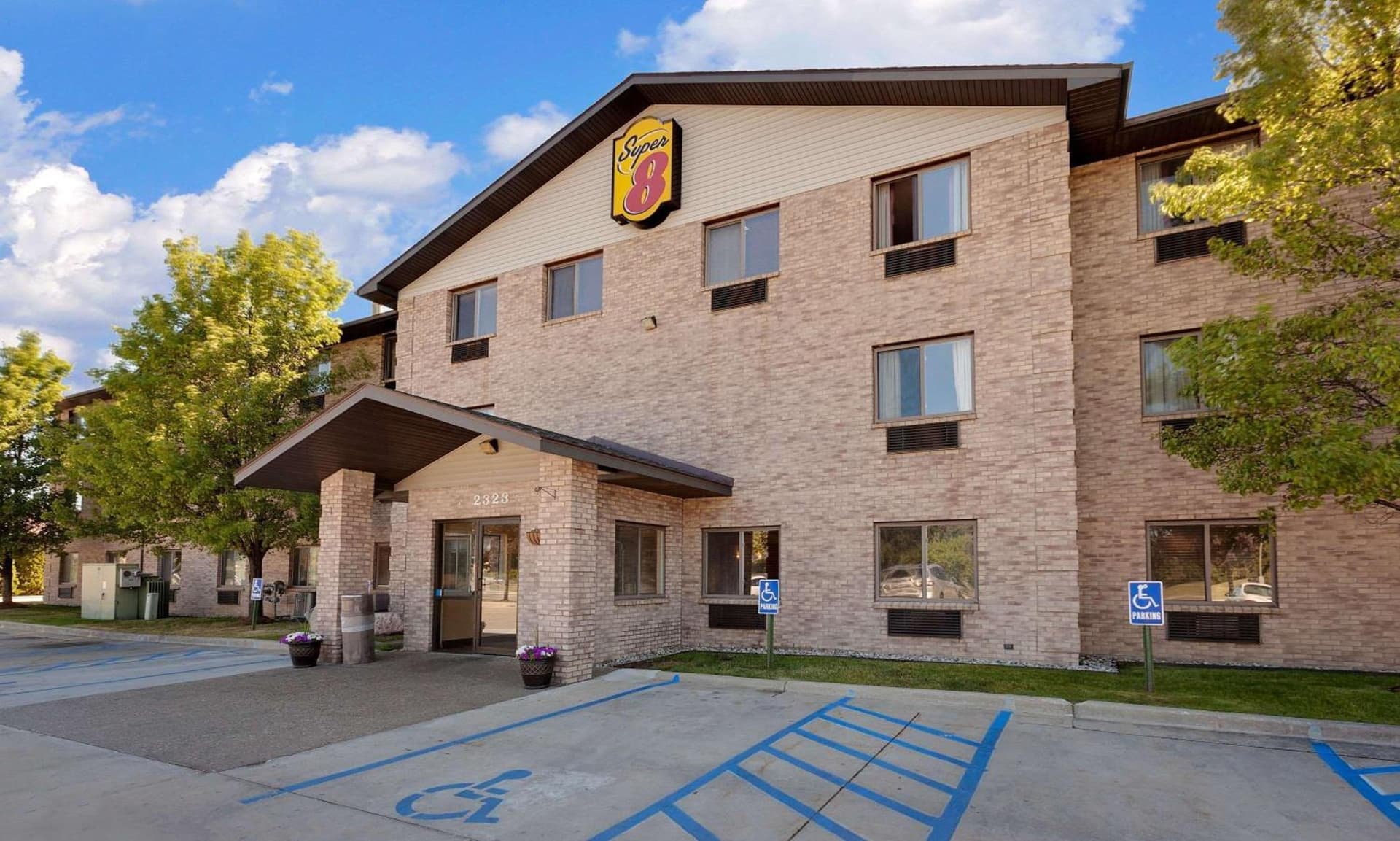 Super 8 by Wyndham Mt. Pleasant featured exterior or lobby in Mount Pleasant, MI — similar hotel