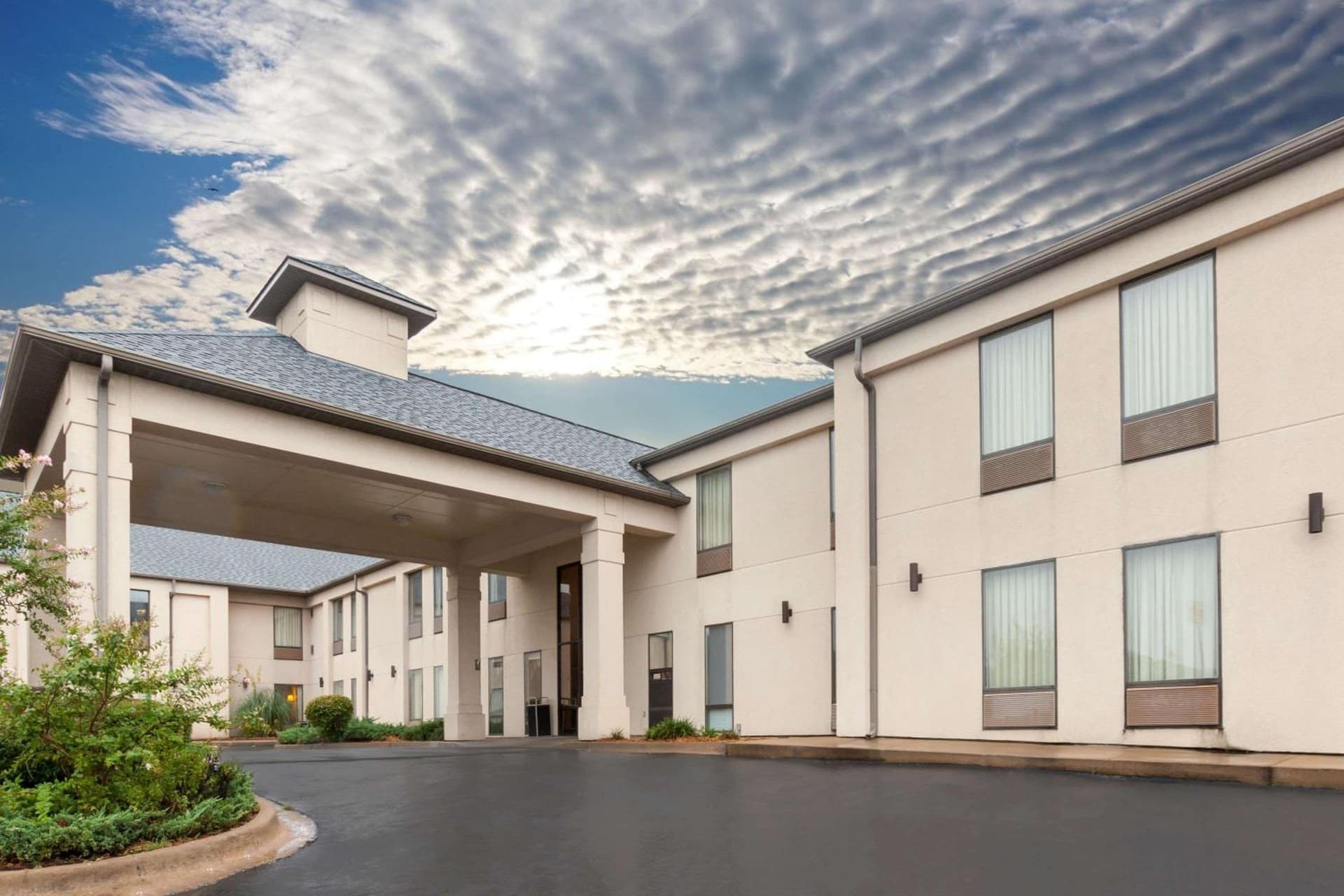 Super 8 by Wyndham Conway featured exterior or lobby in Conway, AR — similar hotel