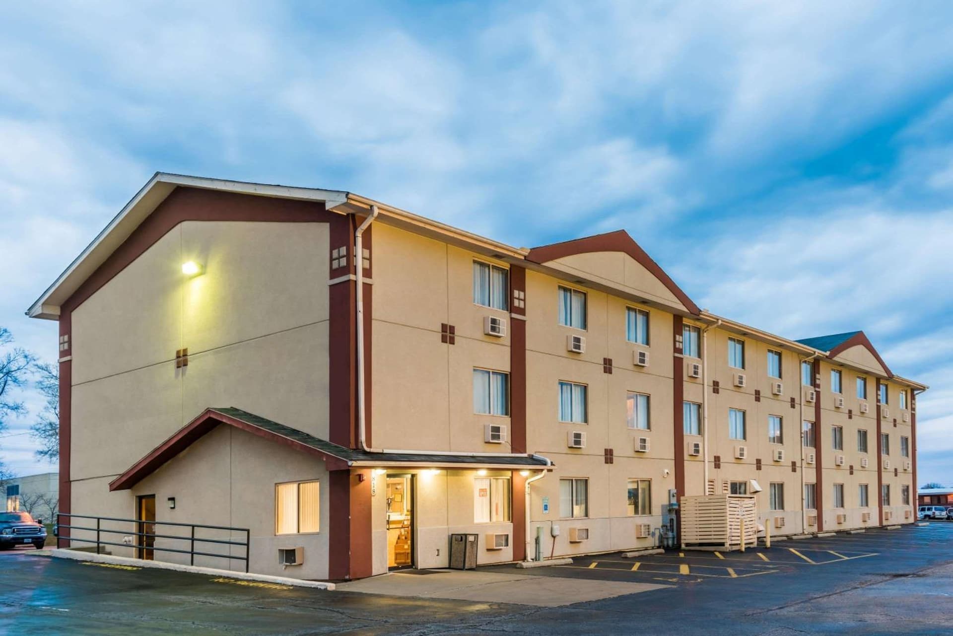 Super 8 by Wyndham Bloomington Normal exterior or lobby in Bloomington, IL — main listing photo