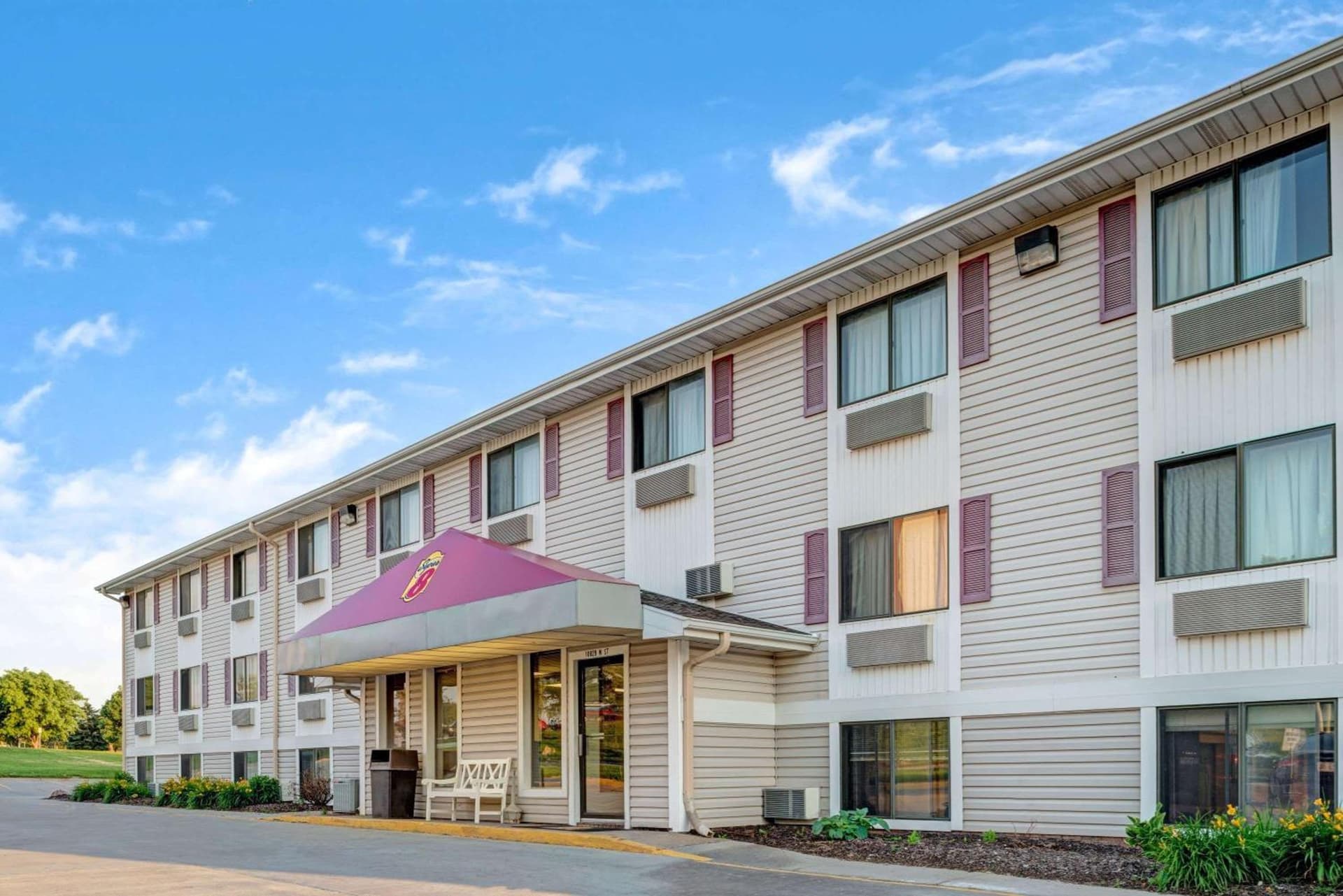 Super 8 by Wyndham Omaha I-80 West featured exterior or lobby in Omaha, NE — similar hotel