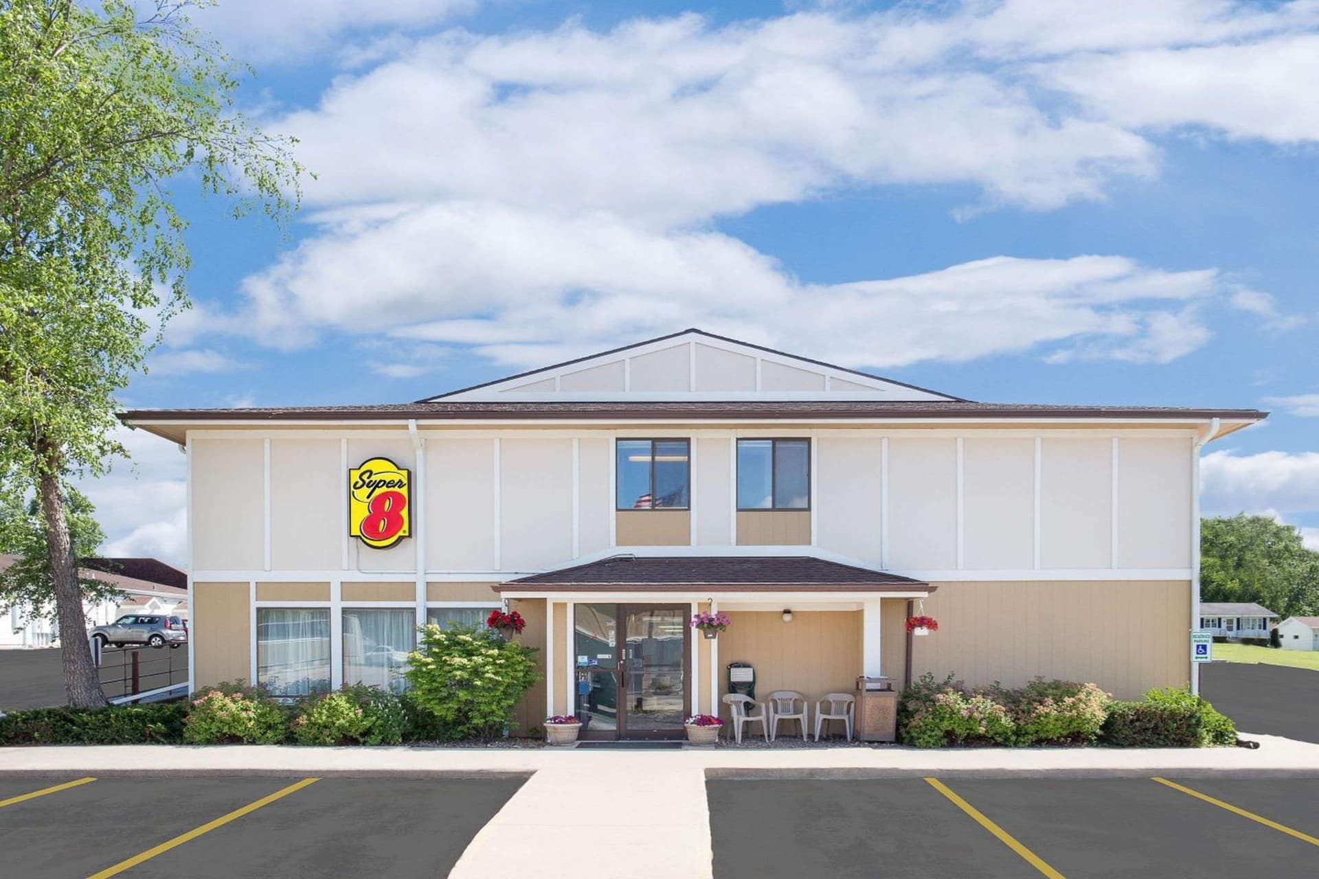 Super 8 by Wyndham Beaver Dam featured exterior or lobby in Beaver Dam, WI — similar hotel
