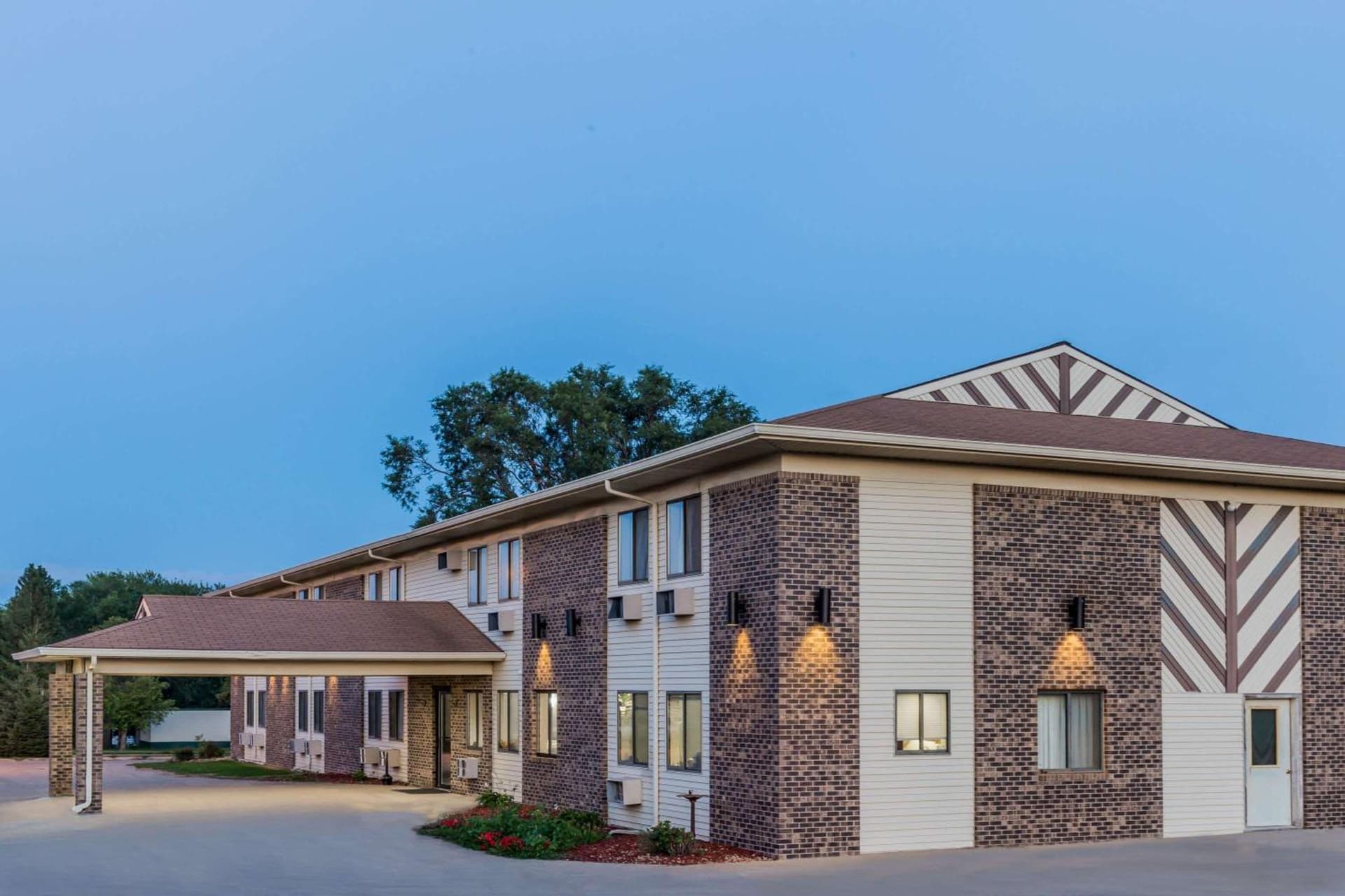 Super 8 by Wyndham Madison featured exterior or lobby in Madison, SD — similar hotel