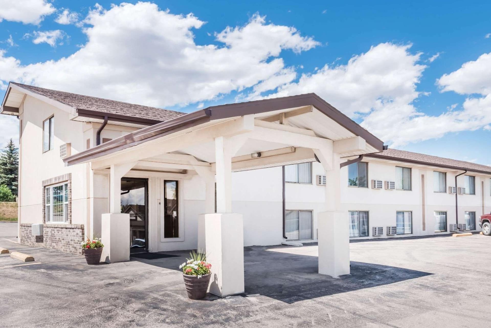 Super 8 by Wyndham Belle Fourche SD featured exterior or lobby in Belle Fourche, SD — similar hotel