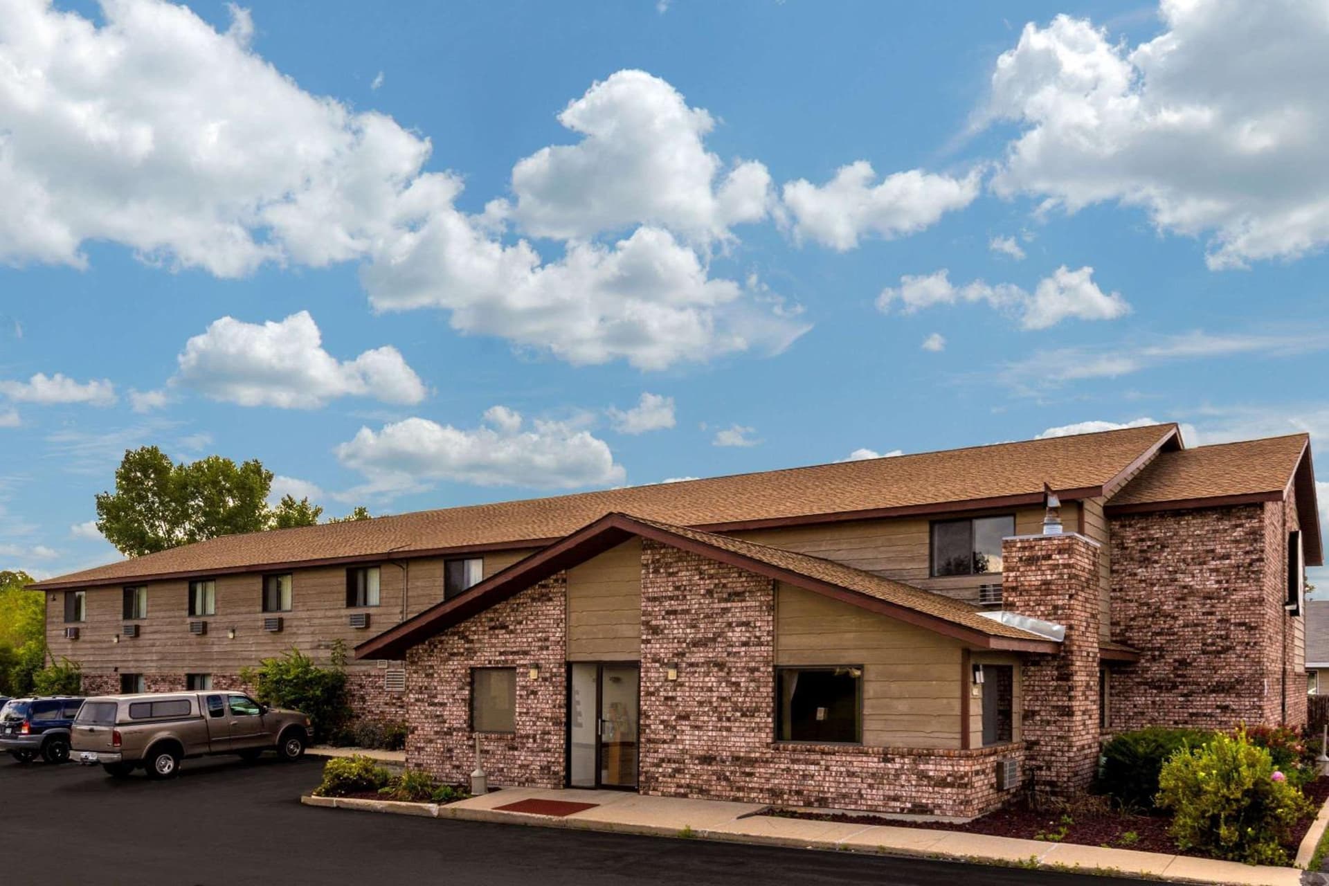 Super 8 by Wyndham Hartford WI featured exterior or lobby in Hartford, WI — similar hotel