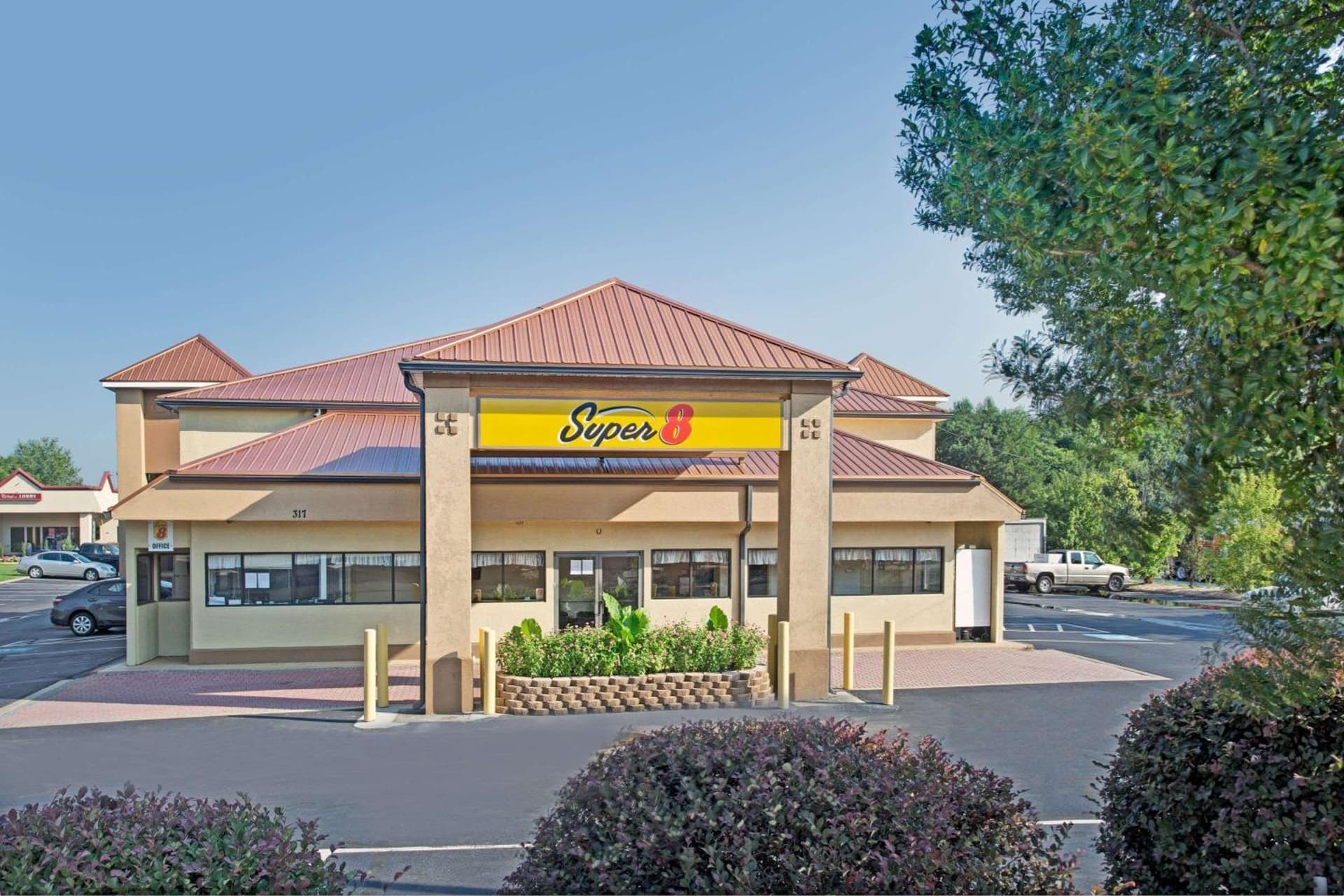 Super 8 by Wyndham Suwanee featured exterior or lobby in Suwanee, GA — similar hotel