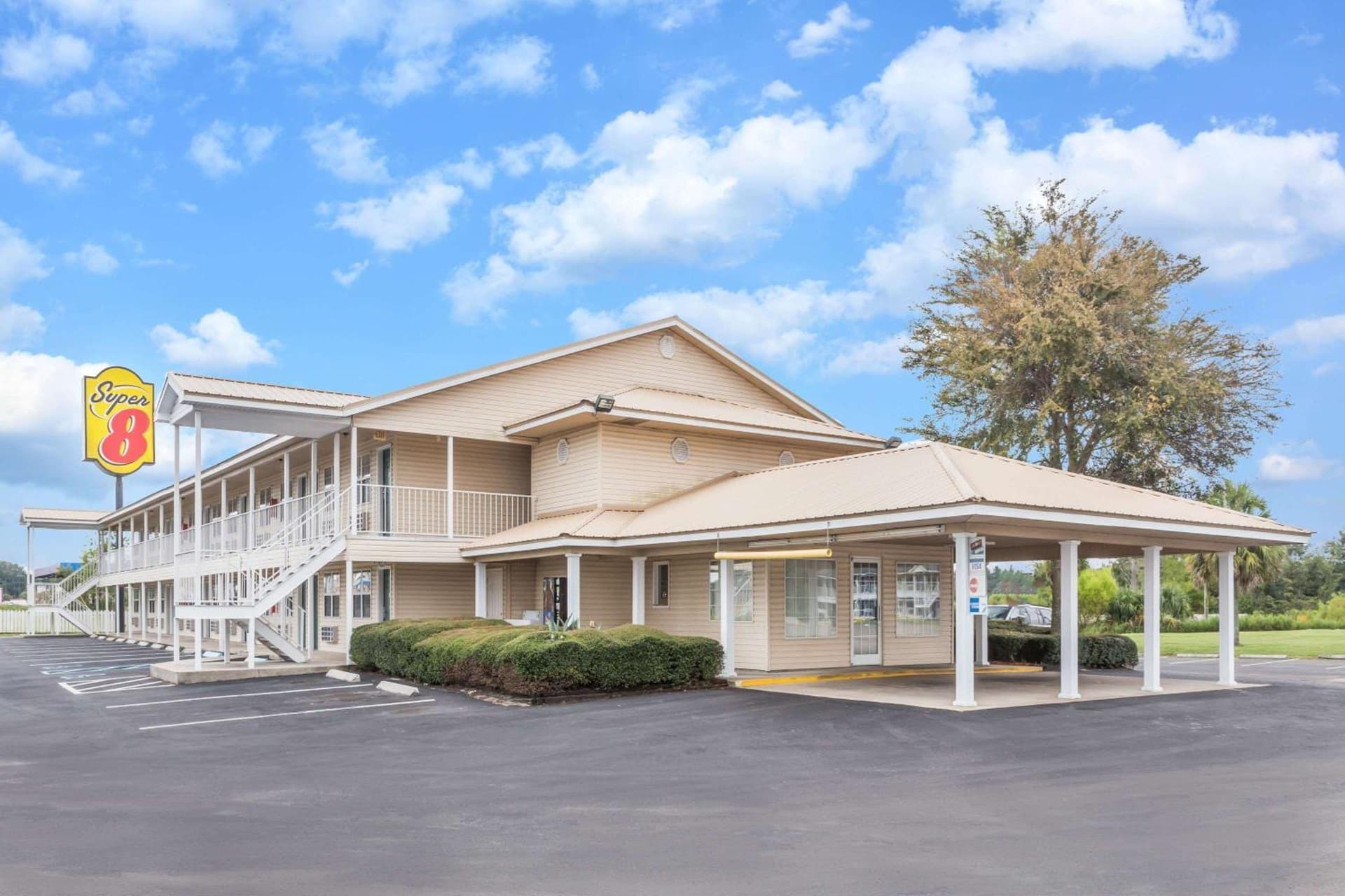Super 8 by Wyndham Madison featured exterior or lobby in Madison, FL — similar hotel