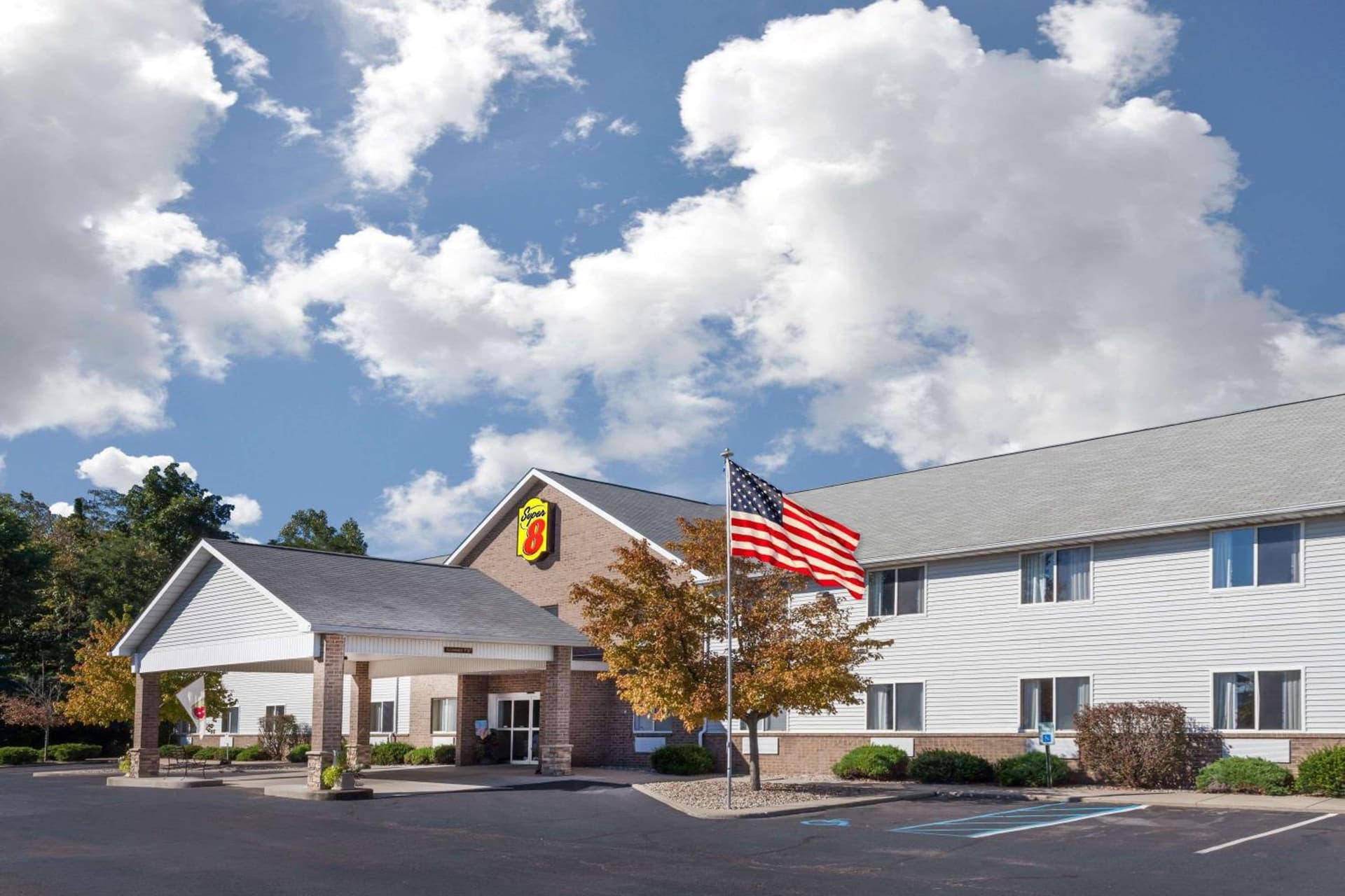 Super 8 by Wyndham Adrian featured exterior or lobby in Adrian, MI — similar hotel