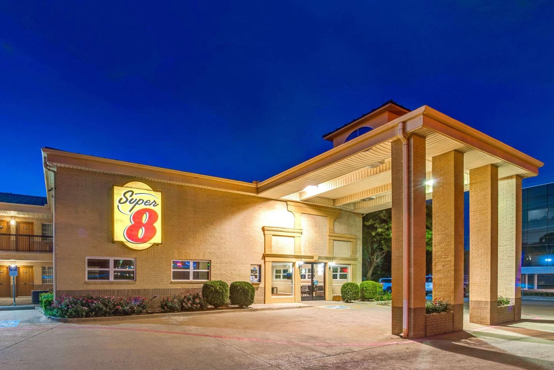 Super 8 by Wyndham Richardson Dallas featured exterior or lobby in Richardson, TX — similar hotel