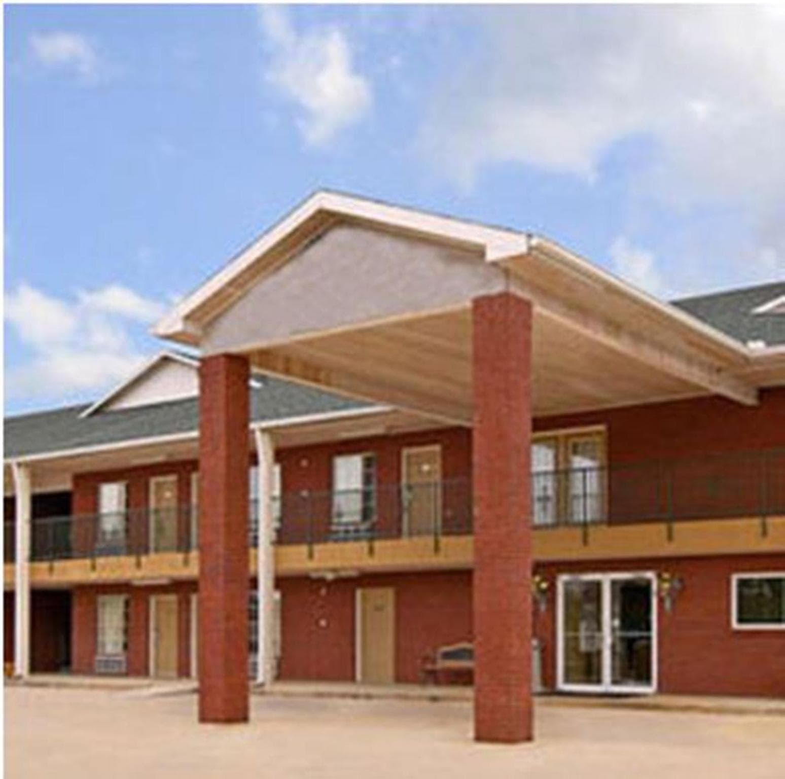 Homegate Inn featured exterior or lobby in Louisville, MS — similar hotel