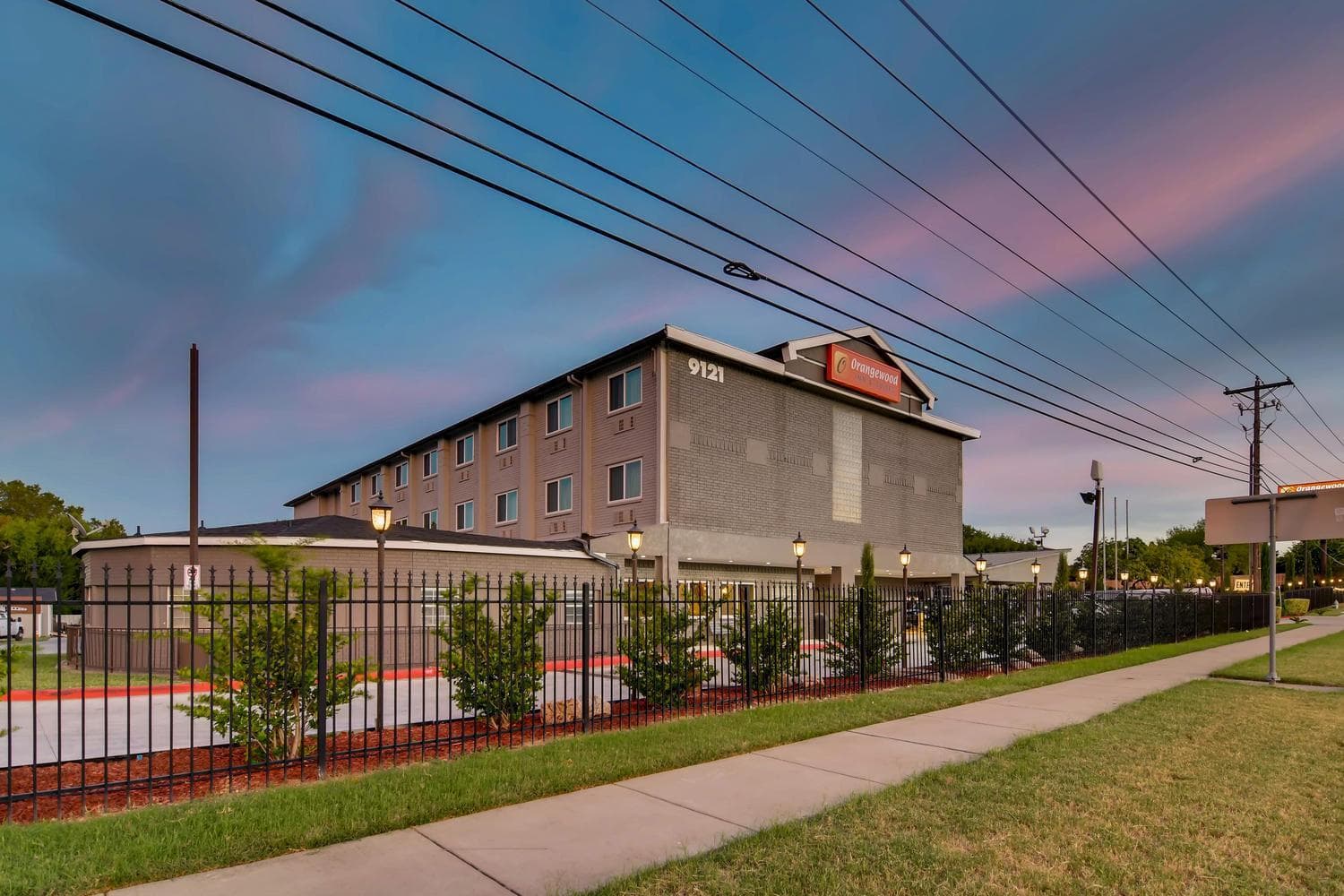 Orangewood Inn and Suites Midtown featured exterior or lobby in Austin, TX — similar hotel