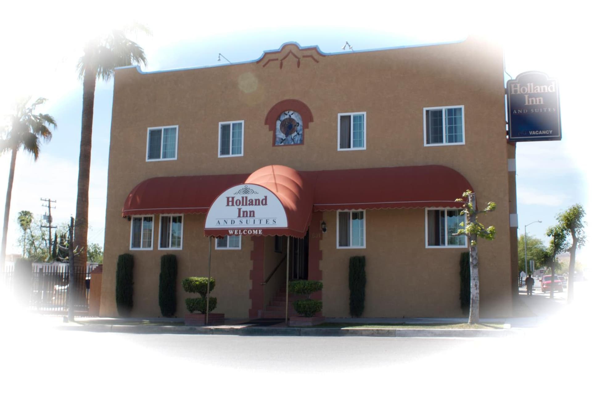 Holland Inn and Suites featured exterior or lobby in Taft, CA — similar hotel
