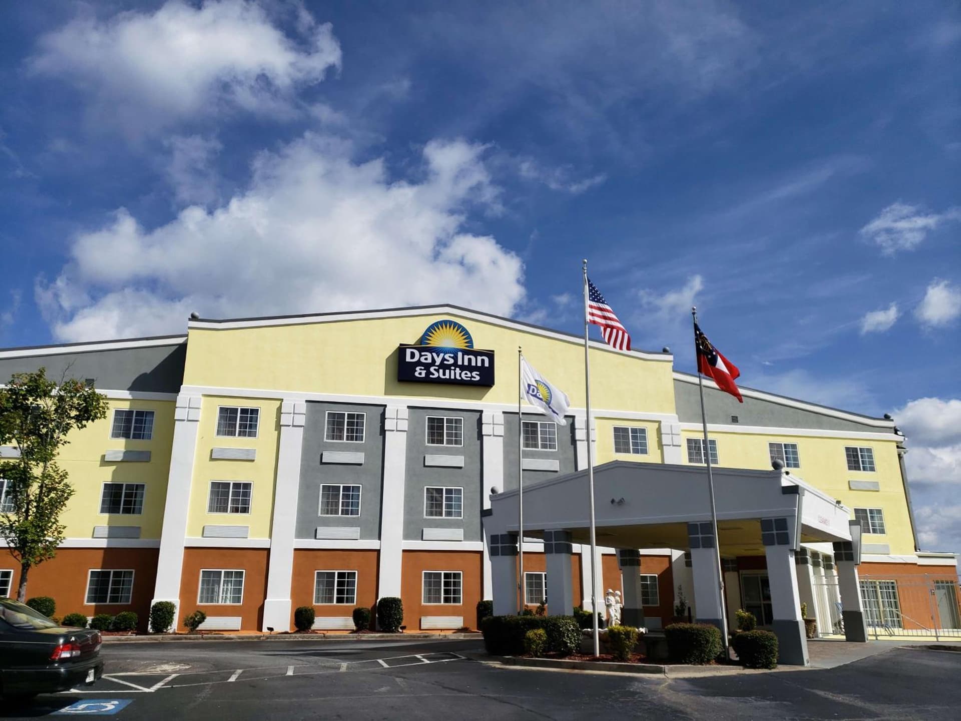 Days Inn & Suites by Wyndham Union City featured exterior or lobby in Union City, GA — similar hotel