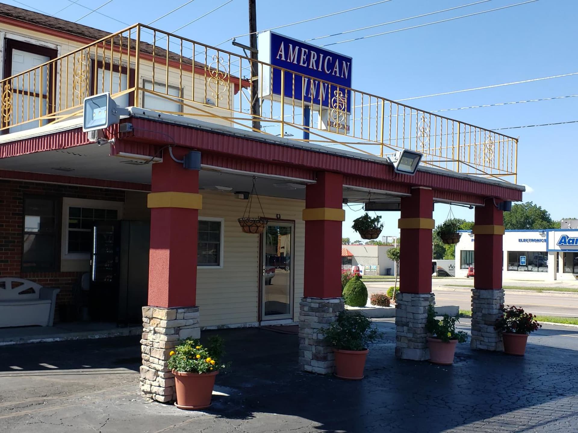 American Inn featured exterior or lobby in Sedalia, MO — similar hotel