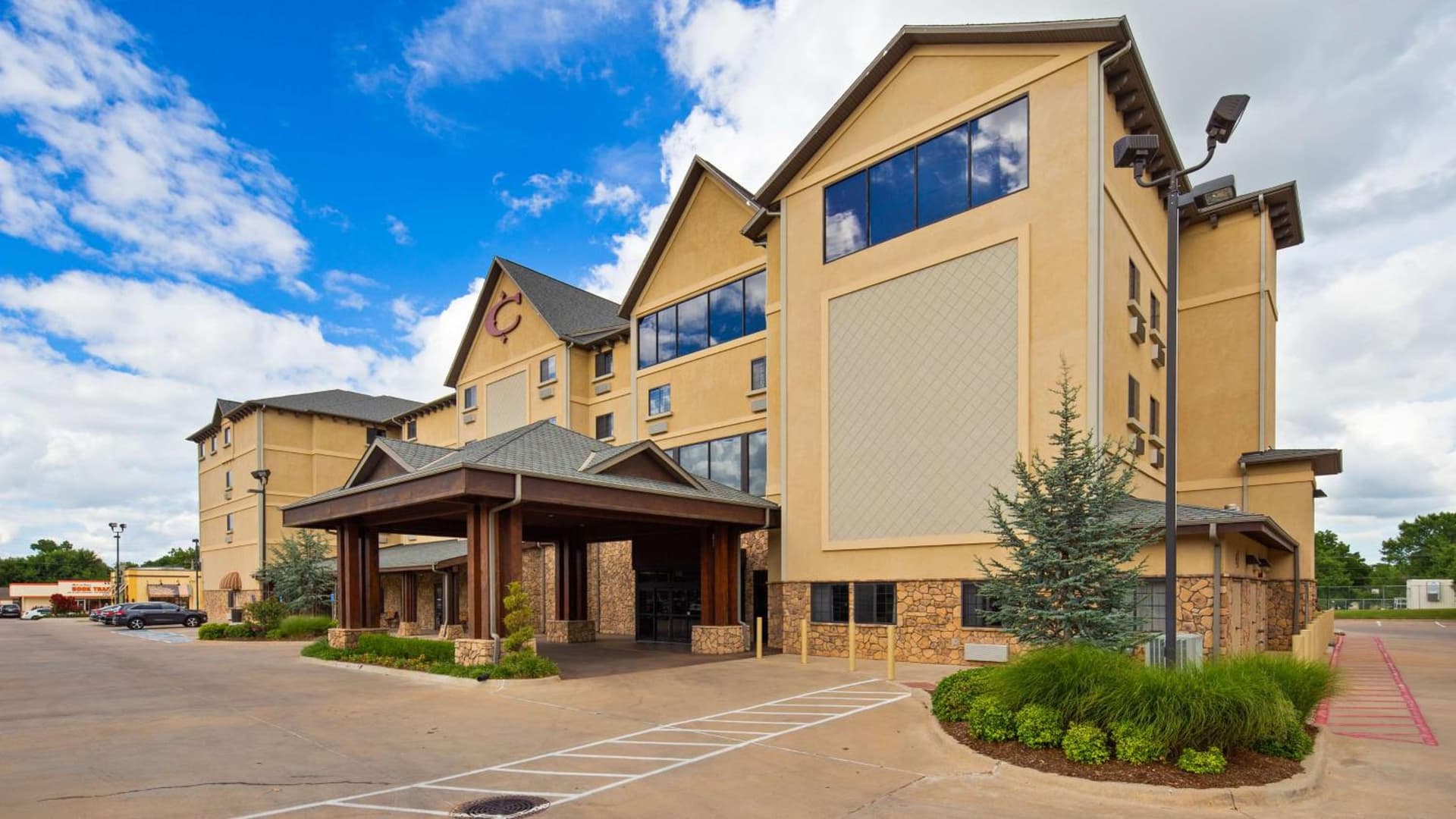 Best Western PLUS Cimarron Hotel & Suites featured exterior or lobby in Stillwater, OK — similar hotel