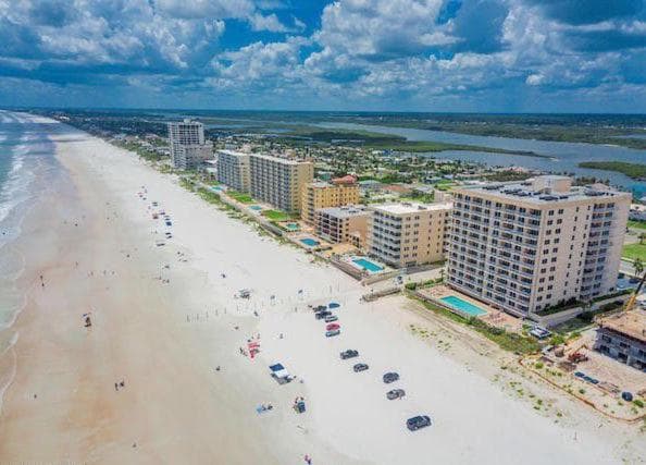 Family Friendly - Direct Oceanfront Sanibel 303 featured exterior or lobby in Daytona Beach Shores, FL — similar hotel