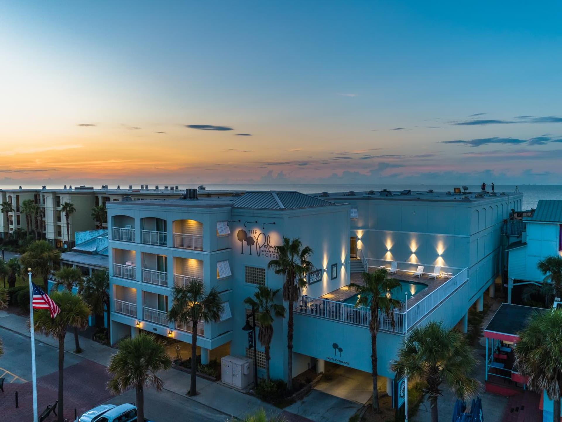 The Palms Oceanfront Hotel featured exterior or lobby in Isle of Palms, SC — similar hotel