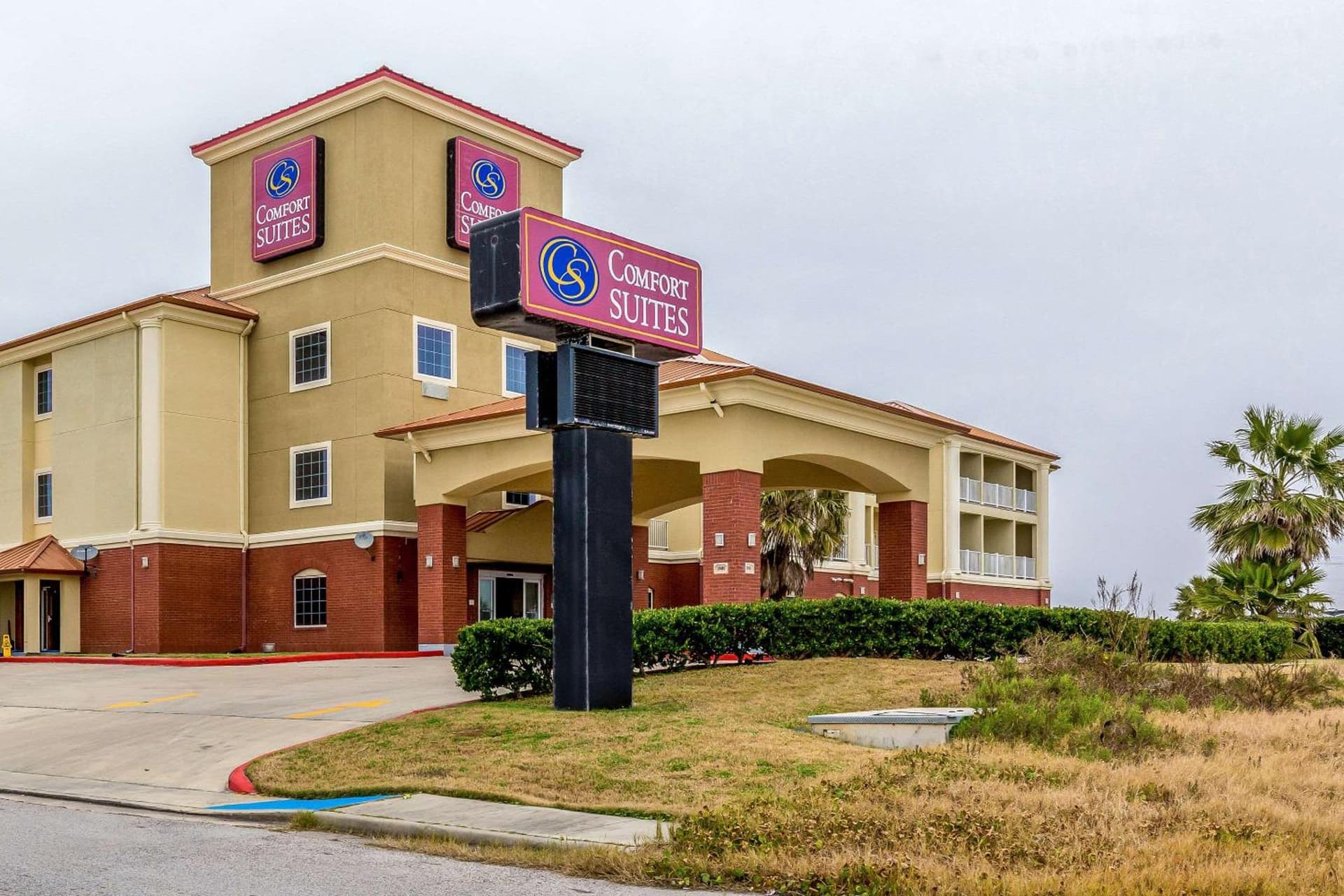 Comfort Suites Galveston Cruise Port Area - Beachside featured exterior or lobby in Galveston, TX — similar hotel