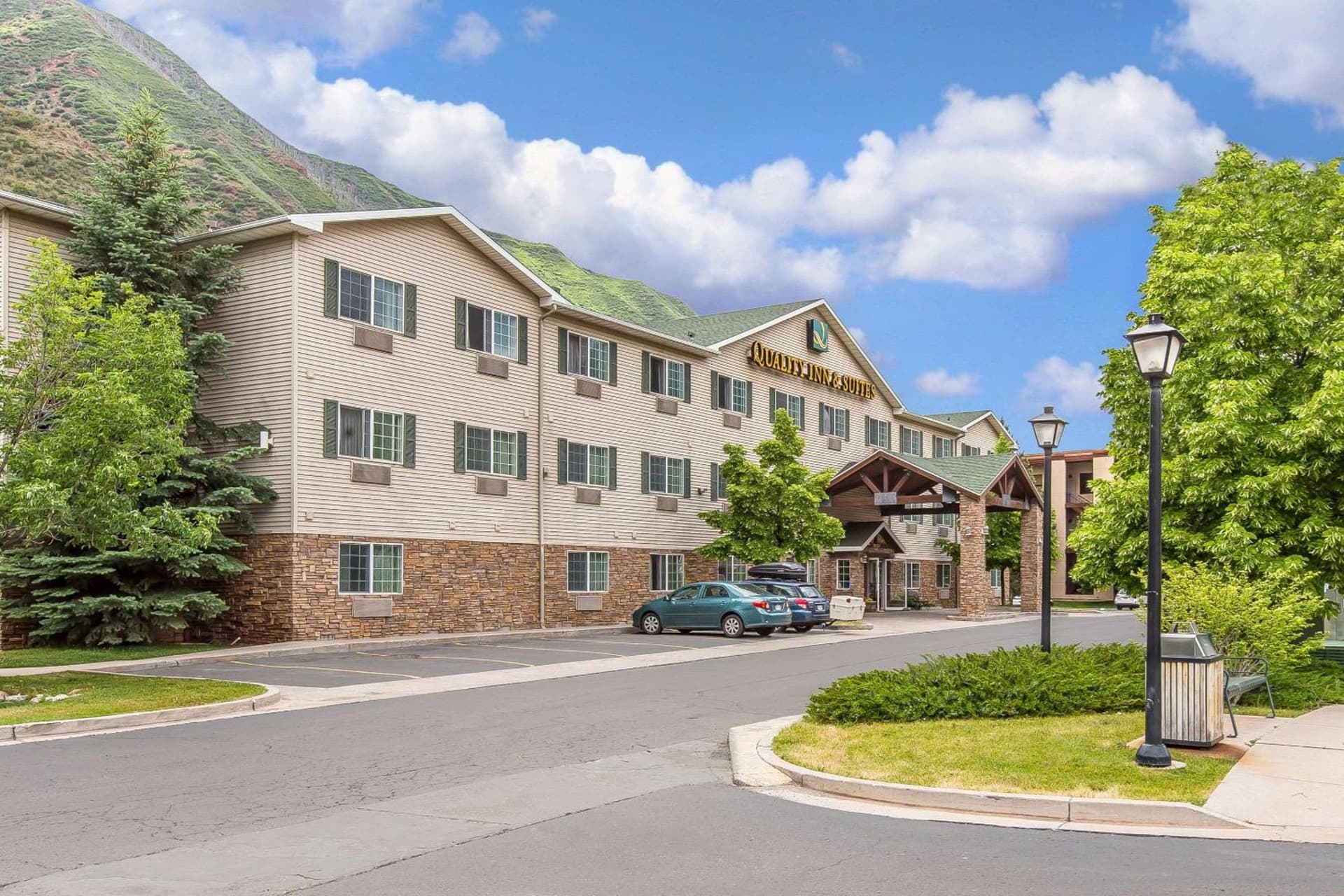 Quality Inn & Suites On The River featured exterior or lobby in Glenwood Springs, CO — similar hotel