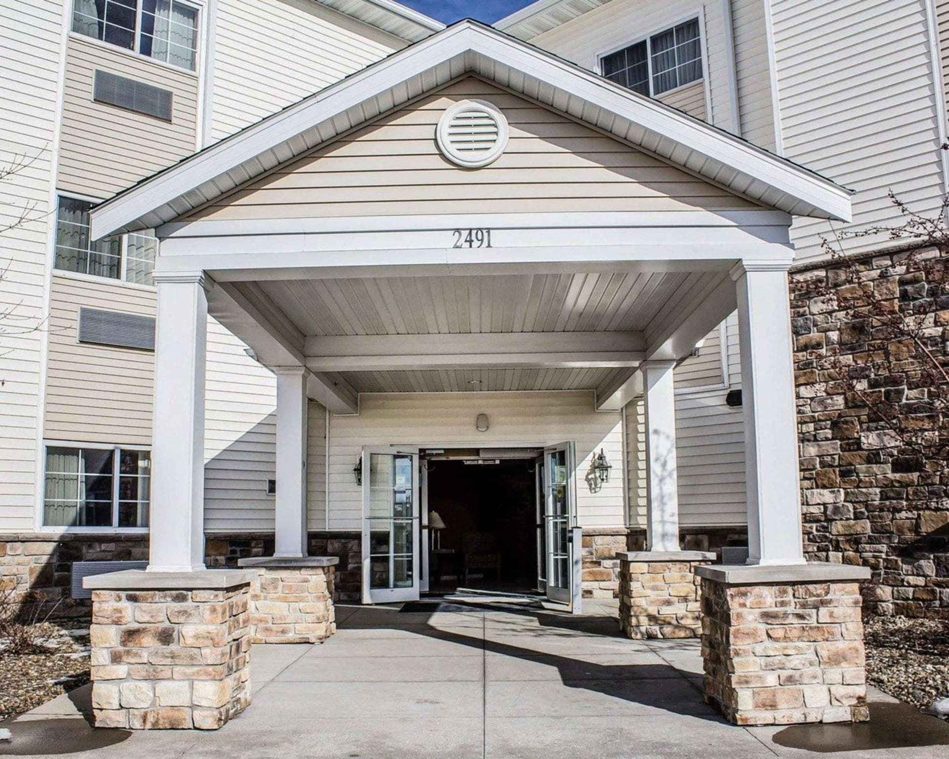 MainStay Suites Coralville - Iowa City featured exterior or lobby in Coralville, IA — similar hotel