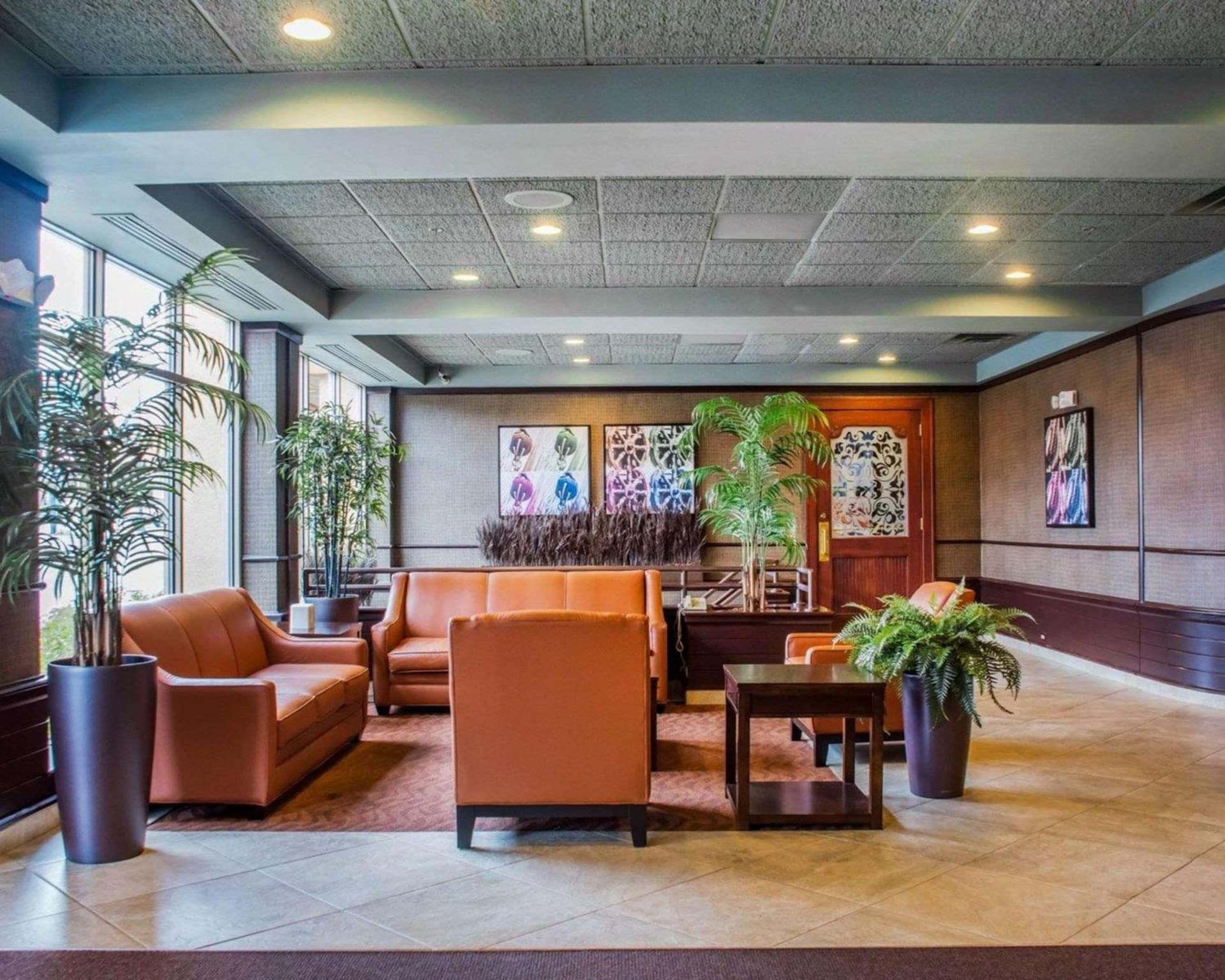 Clarion Hotel & Suites Riverfront featured exterior or lobby in Oswego, NY — similar hotel