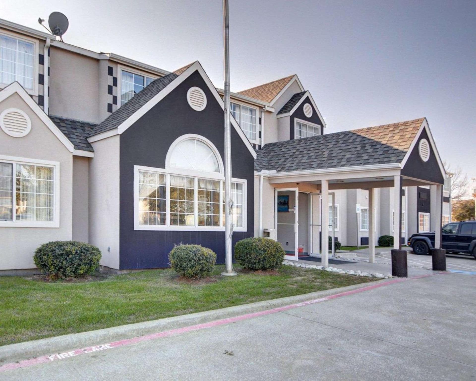 Rodeway Inn & Suites Lewisville I-35 exterior or lobby in Lewisville, TX — main listing photo