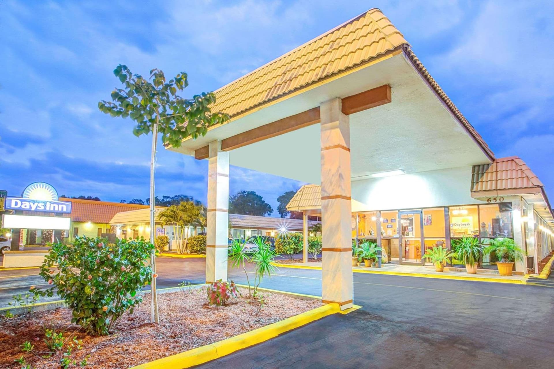 Days Inn by Wyndham St. Petersburg Central featured exterior or lobby in St Petersburg, FL — similar hotel