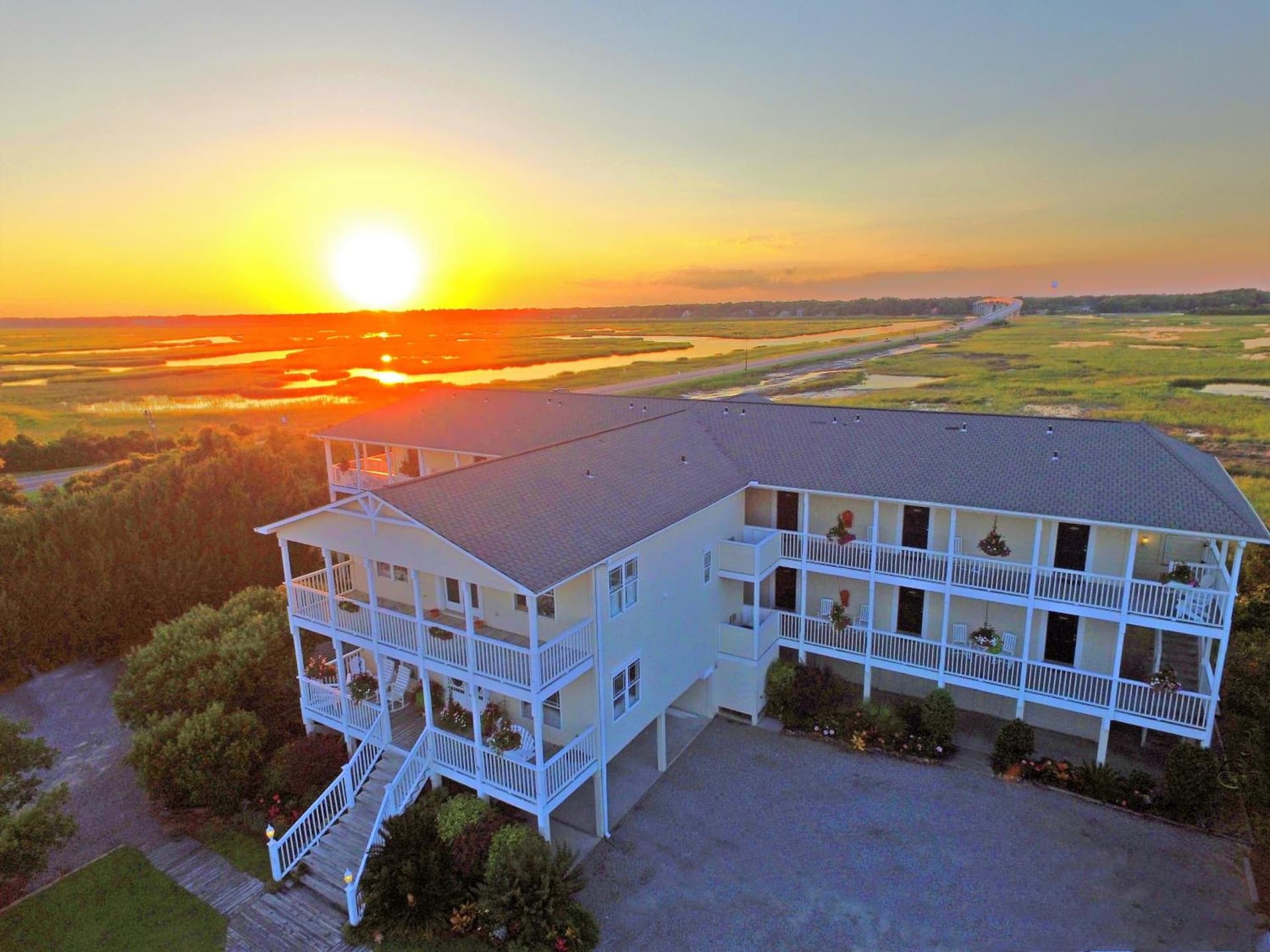 The Sunset Inn featured exterior or lobby in Sunset Beach, NC — similar hotel