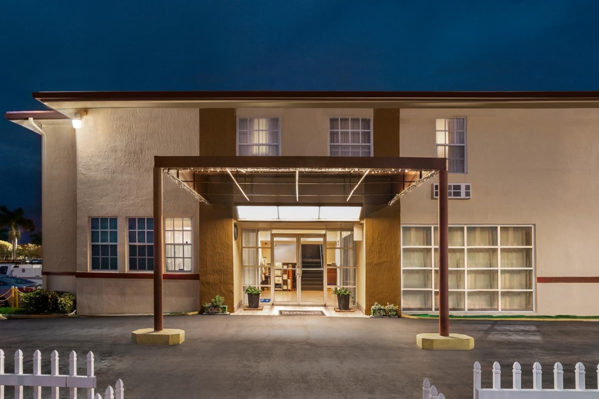 Belmont Inn & Suites featured exterior or lobby in Florida City, FL — similar hotel