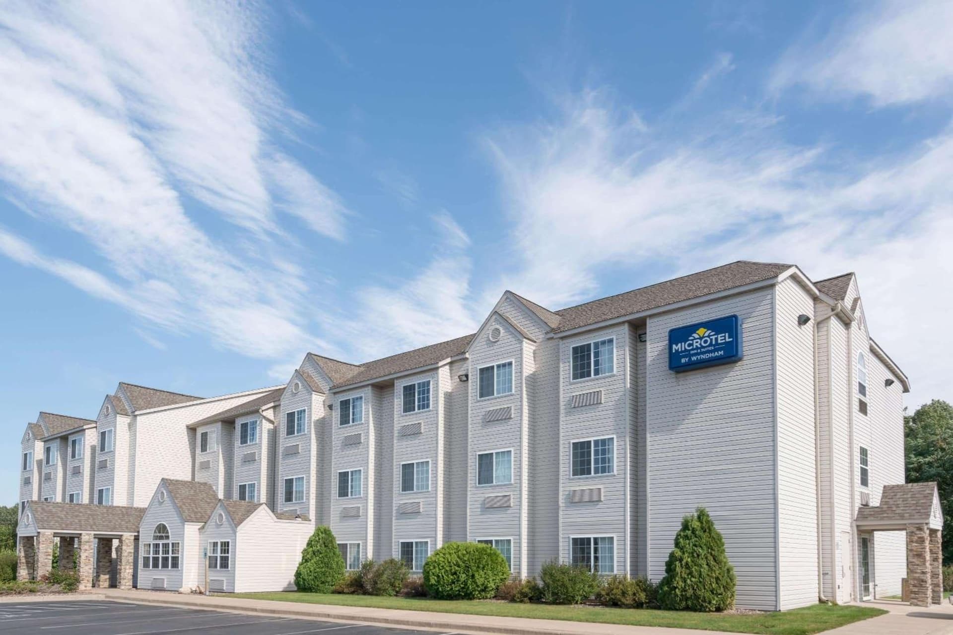 Microtel Inn & Suites by Wyndham Rice Lake featured exterior or lobby in Rice Lake, WI — similar hotel