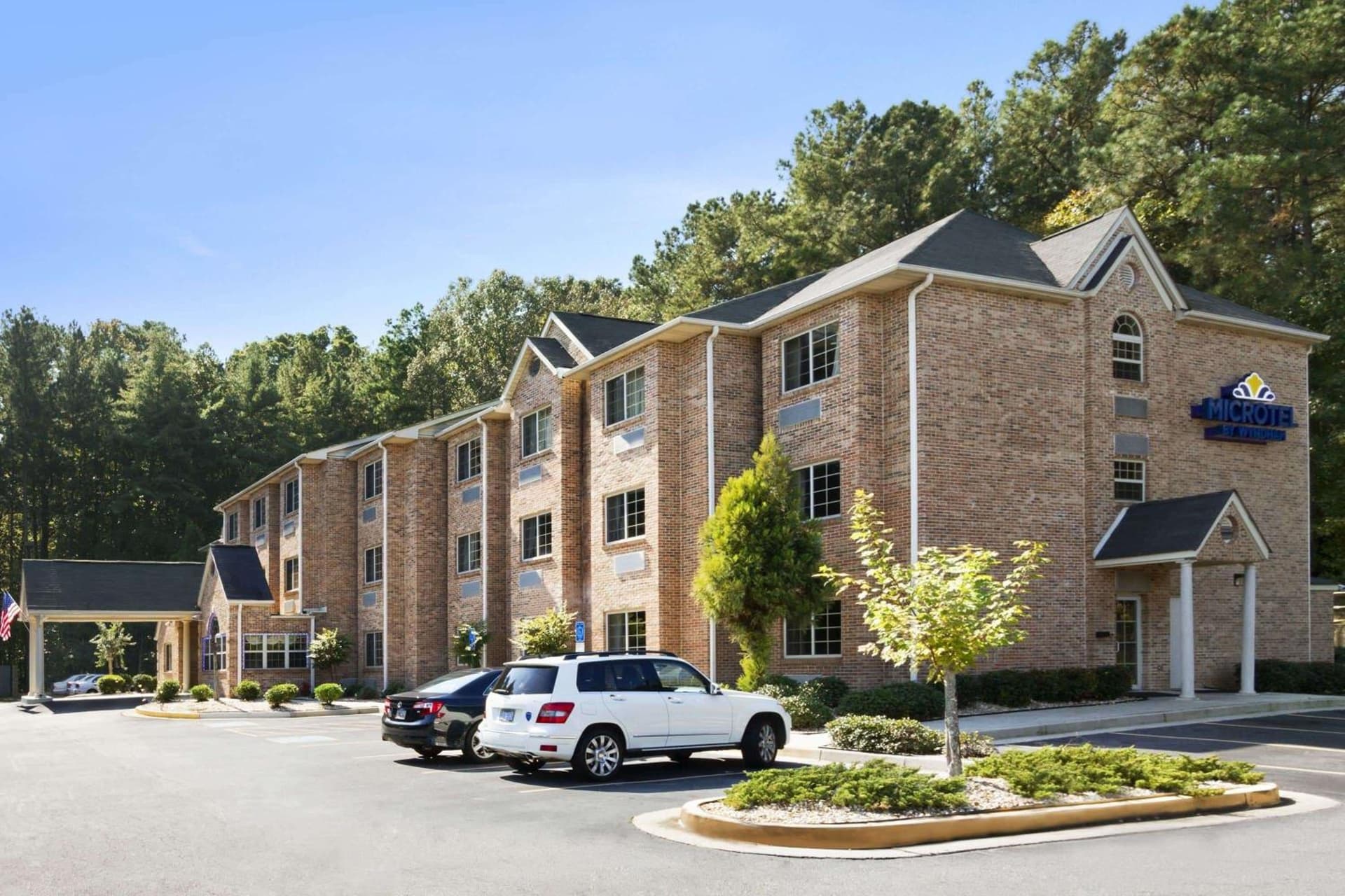 Microtel Inn & Suites by Wyndham Lithonia/Stone Mountain featured exterior or lobby in Lithonia, GA — similar hotel