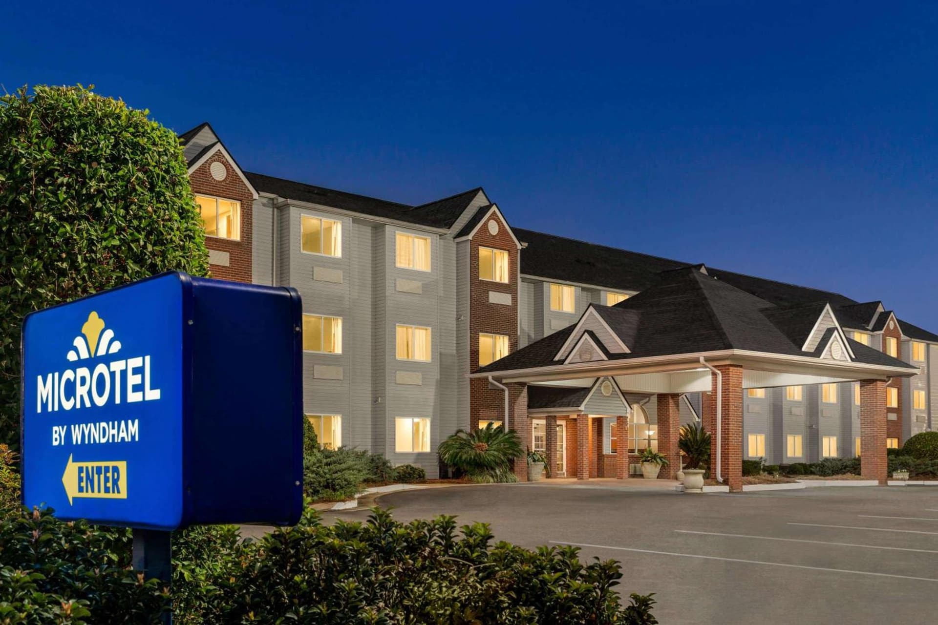 Microtel Inn & Suites by Wyndham featured exterior or lobby in Tifton, GA — similar hotel