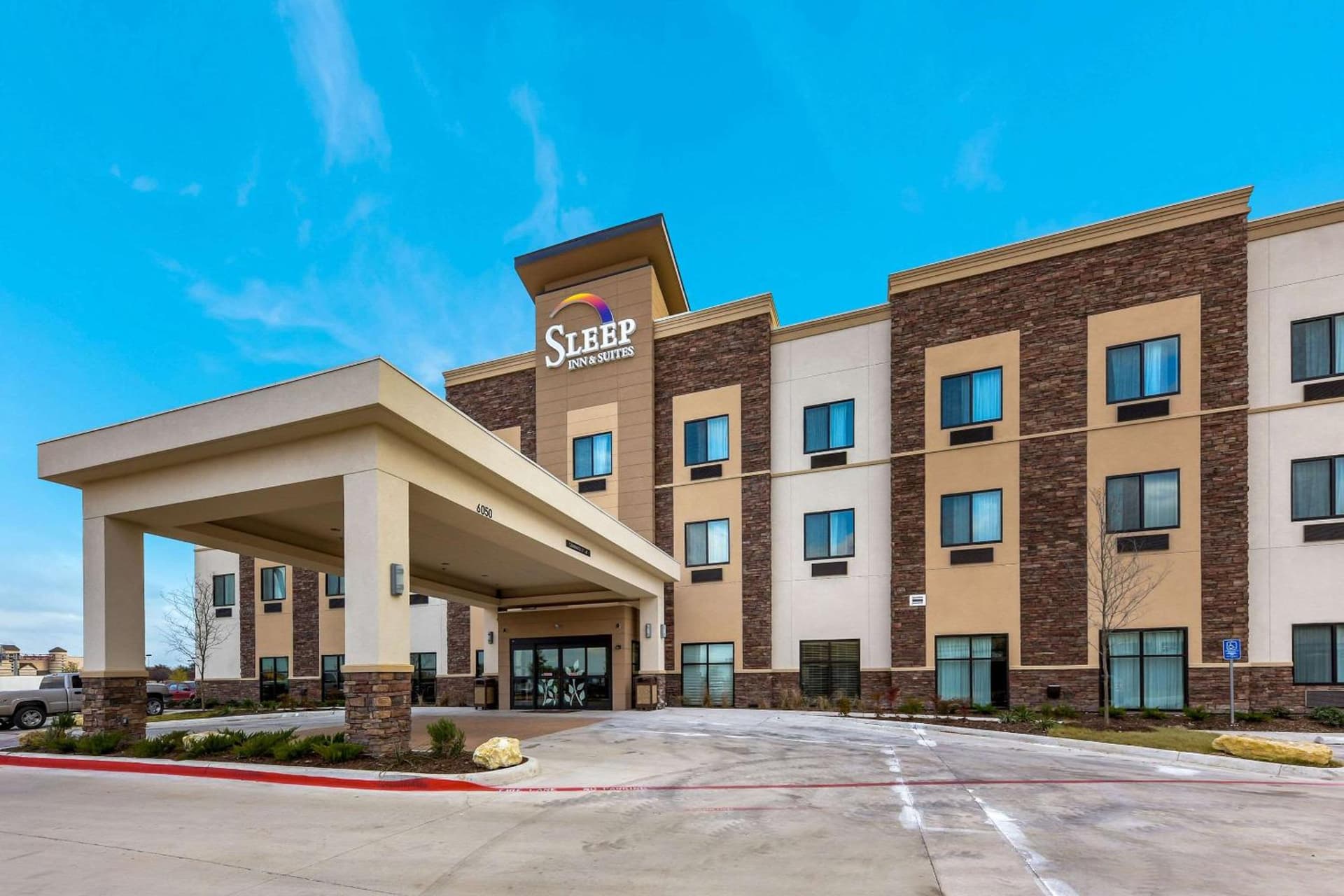 Sleep Inn & Suites Fort Worth - Fossil Creek exterior or lobby in Fort Worth, TX — main listing photo