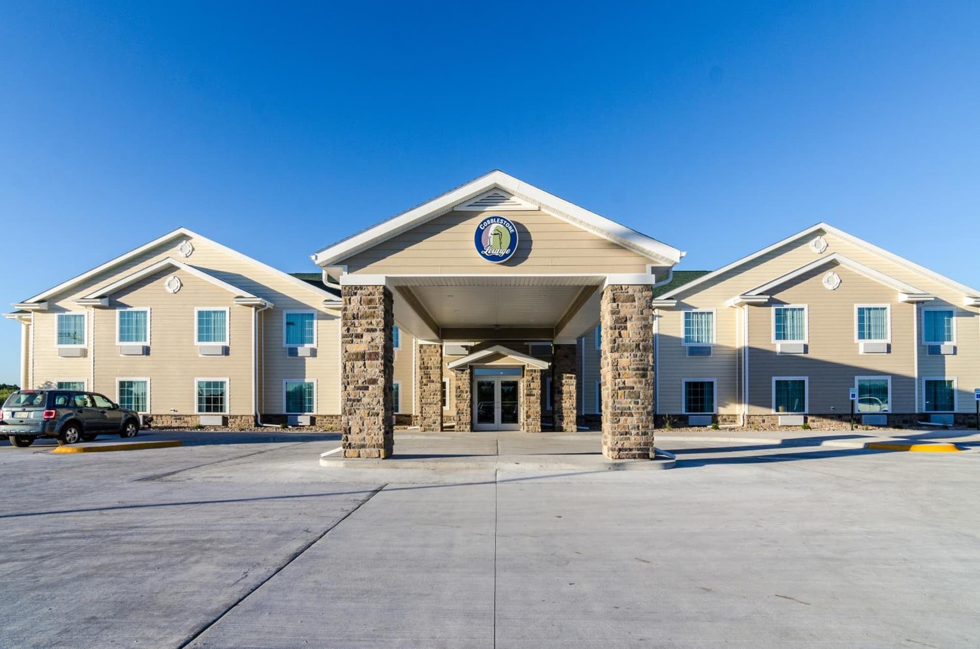 Cobblestone Inn & Suites - Ord featured exterior or lobby in Ord, NE — similar hotel