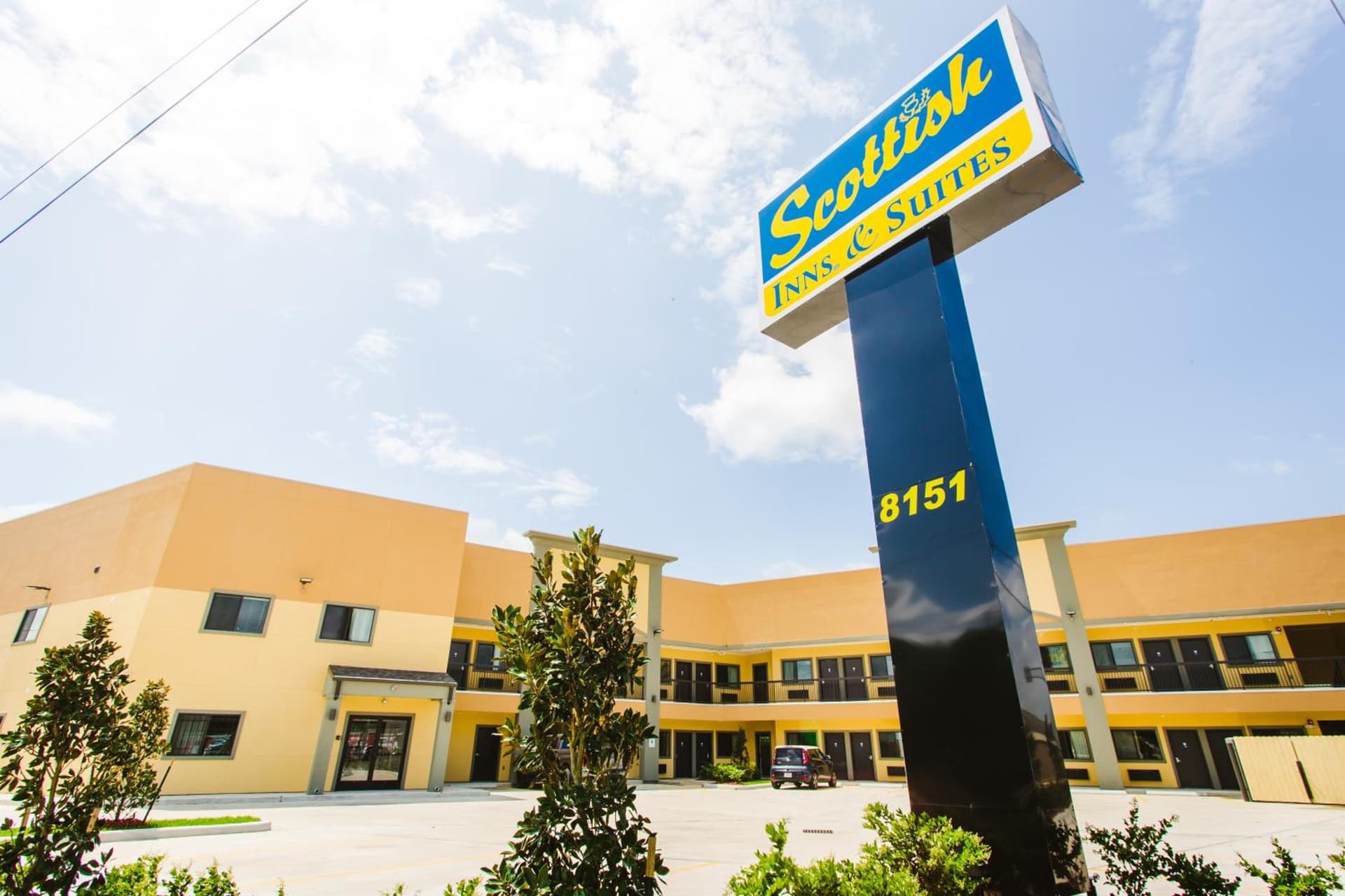 scottish inn & suites featured exterior or lobby in Baytown, TX — similar hotel