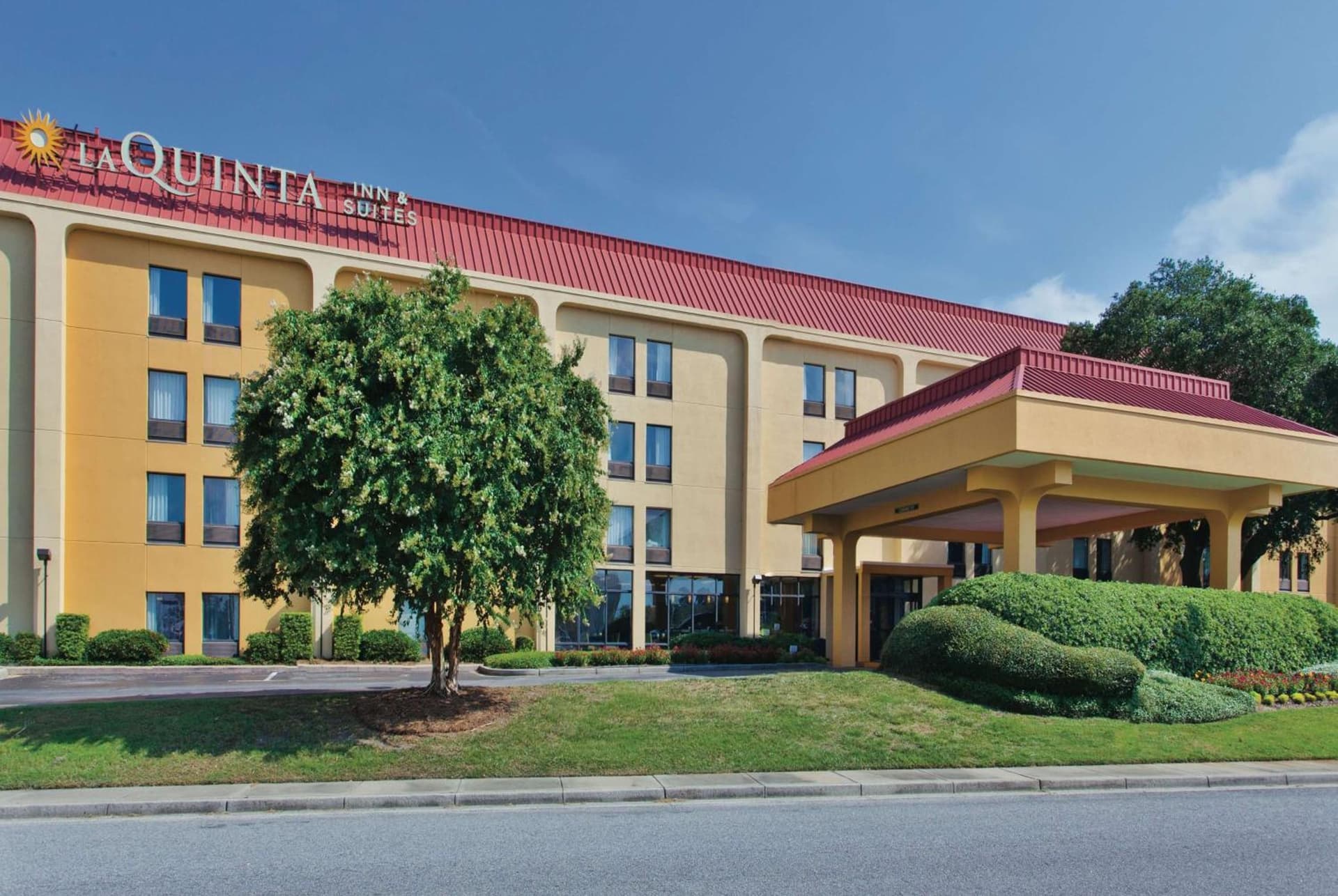 La Quinta Inn & Suites by Wyndham Charleston Riverview featured exterior or lobby in Charleston, SC — similar hotel