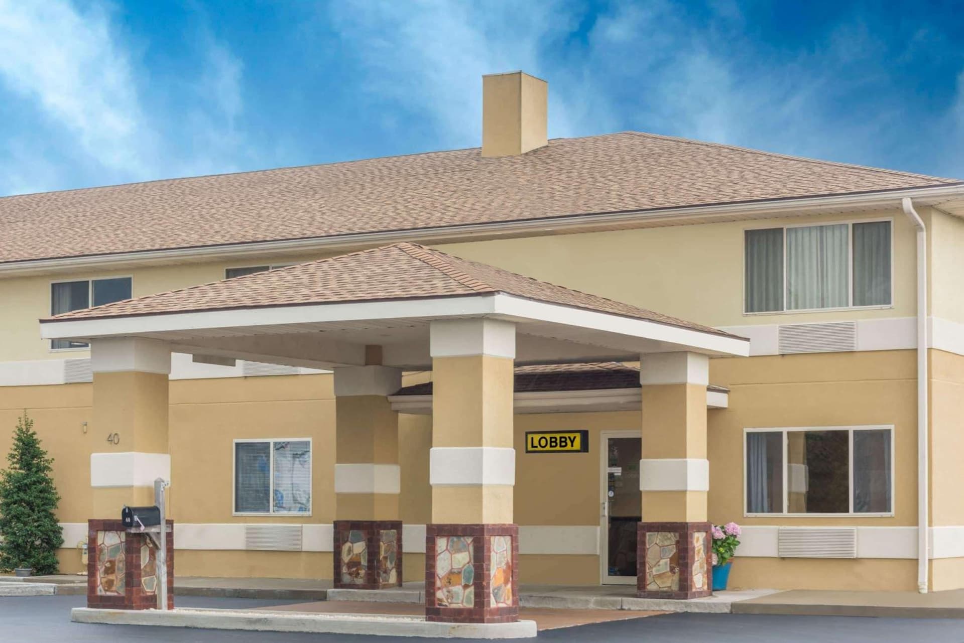 Super 8 by Wyndham Hanover featured exterior or lobby in Hanover, PA — similar hotel