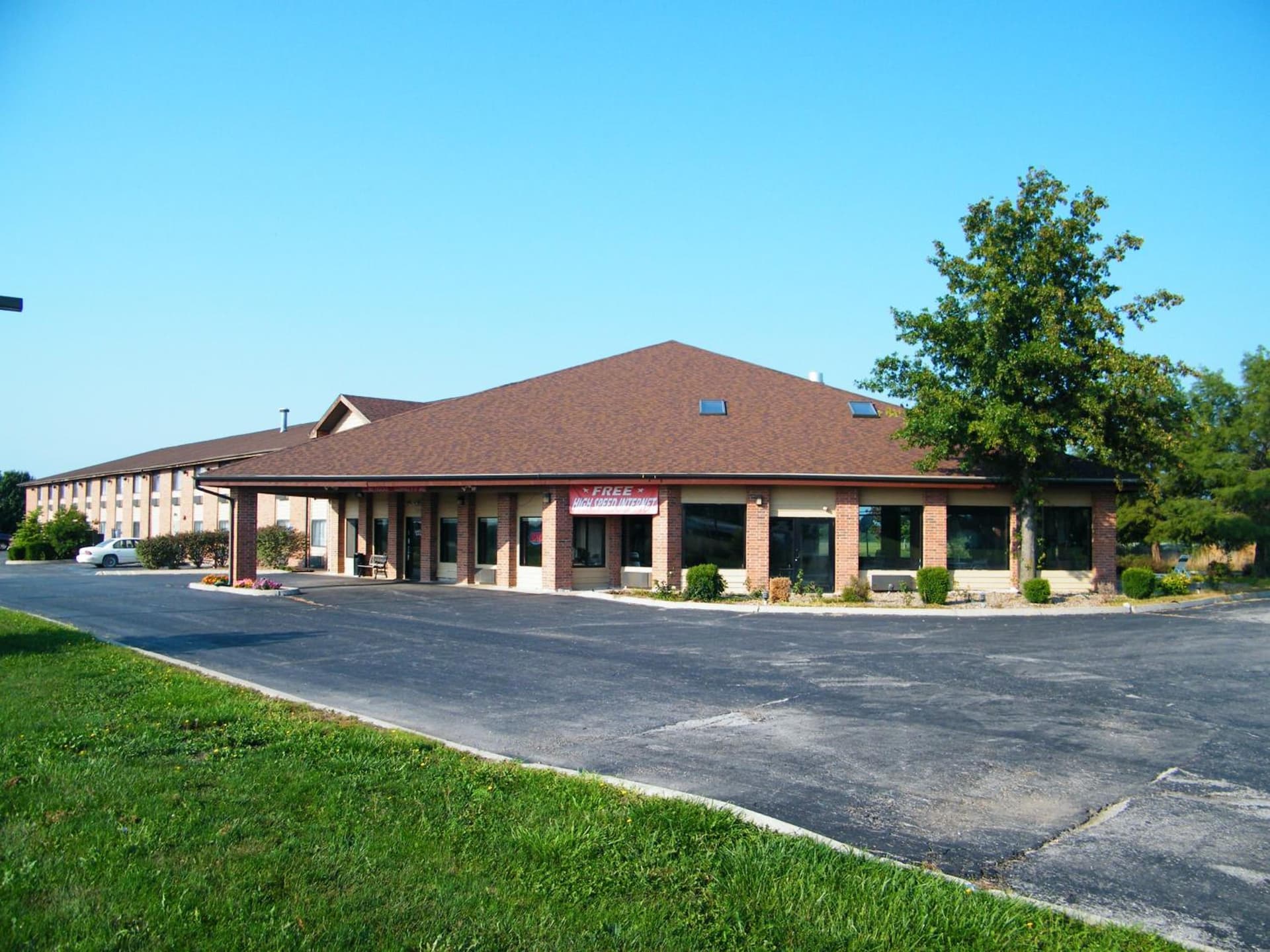 Capital O Amerihost Inn and Suites Mexico Hwy 54 MO featured exterior or lobby in Mexico, MO — similar hotel