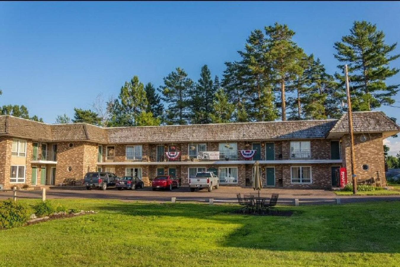 Budget Host Inn featured exterior or lobby in Ironwood, MI — similar hotel