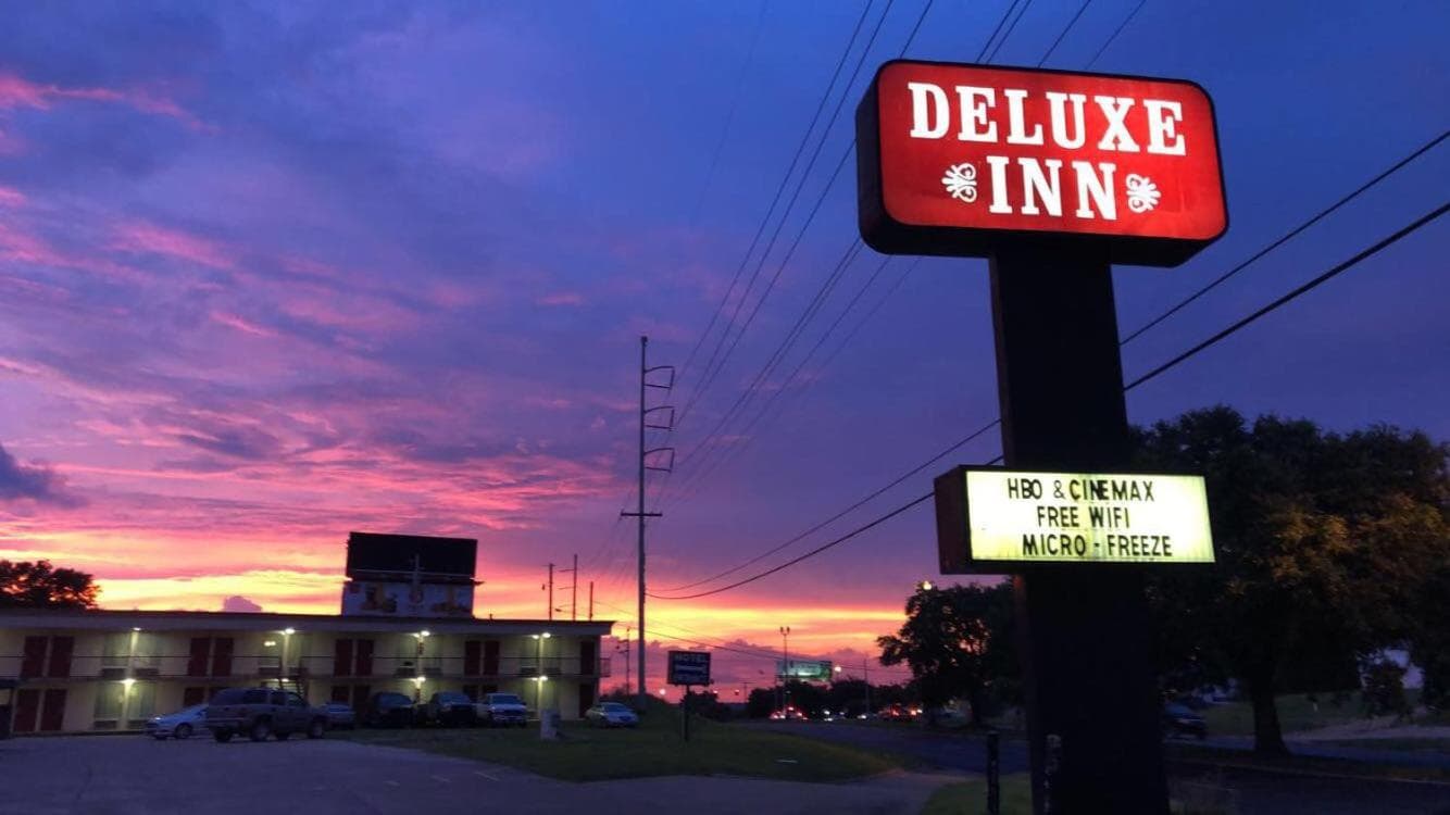 Deluxe Inn featured exterior or lobby in Natchez, MS — similar hotel