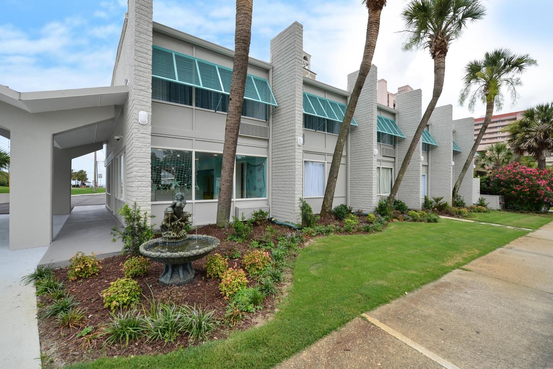 The Mermaid Inn featured exterior or lobby in Myrtle Beach, SC — similar hotel
