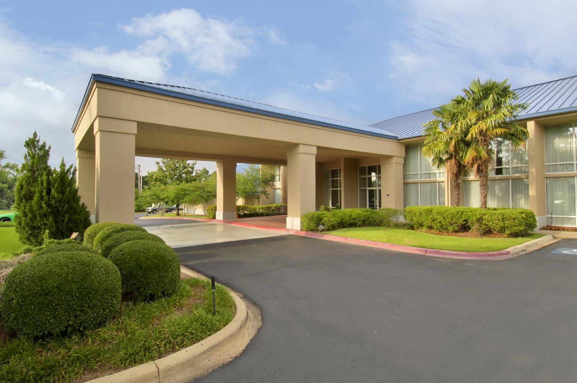 Economy Inn & Suites featured exterior or lobby in Shreveport, LA — similar hotel