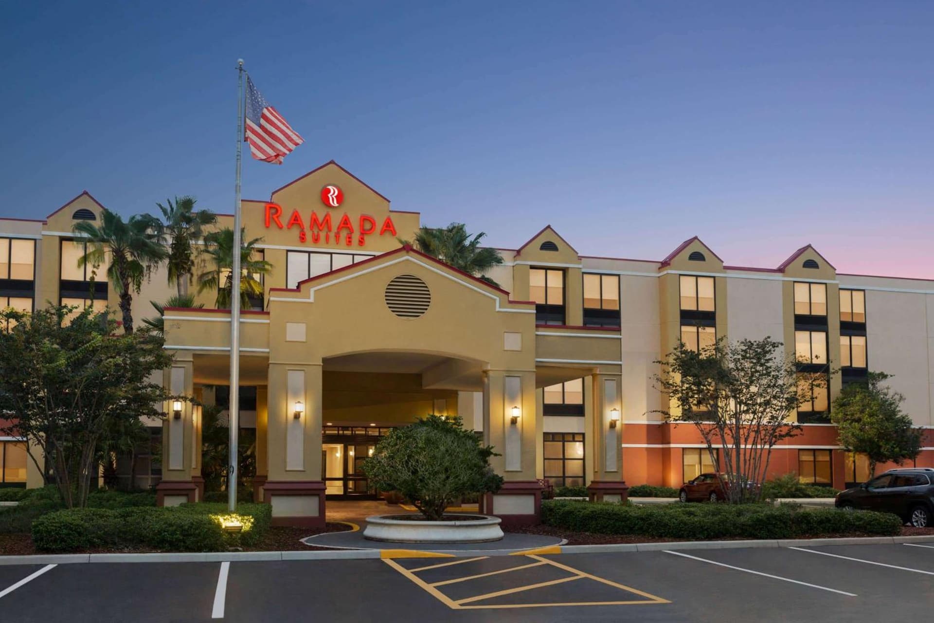 Ramada by Wyndham Suites Orlando Airport- Free Airport Shuttle exterior or lobby in Orlando, FL — main listing photo