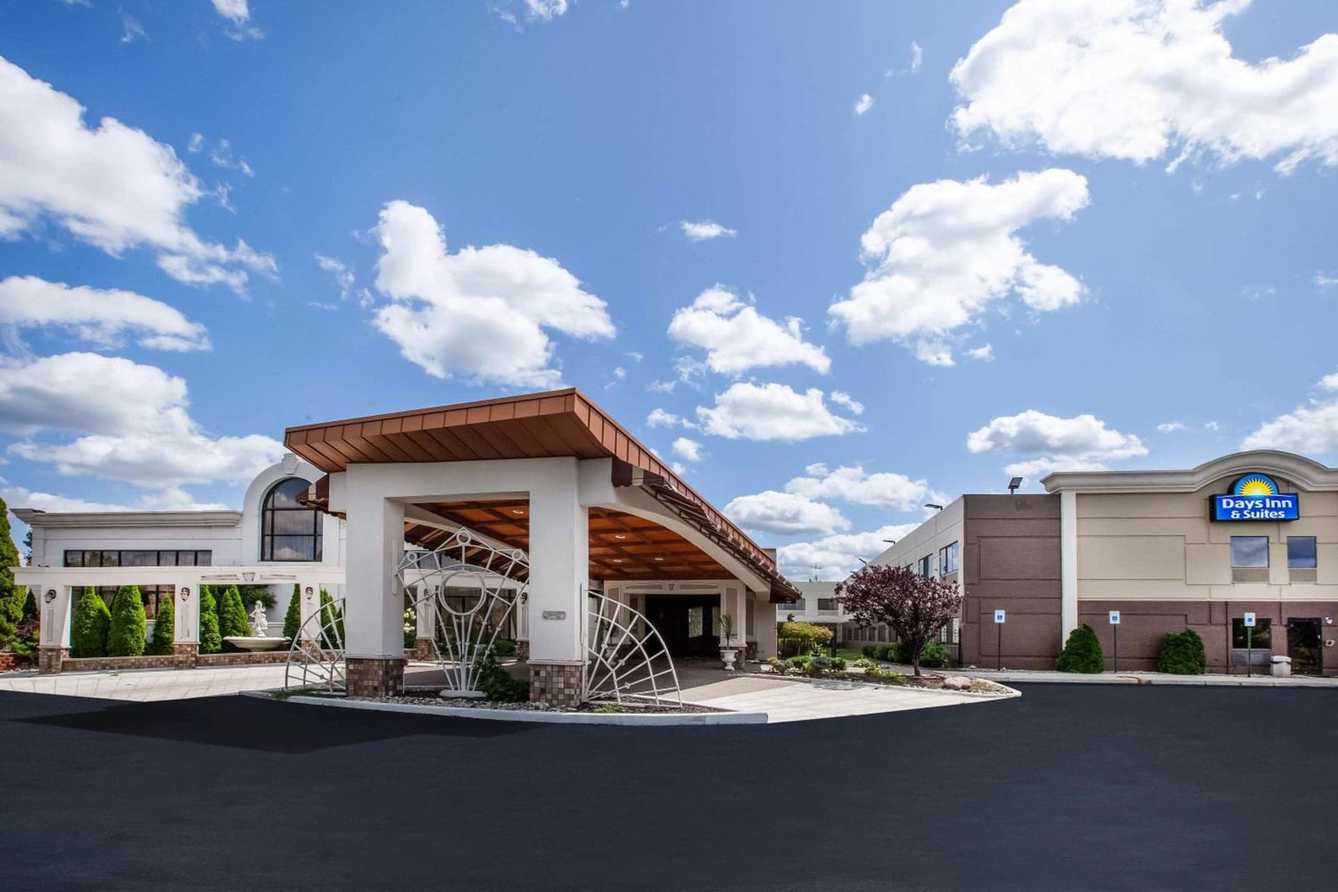 Days Inn & Suites by Wyndham Rochester Hills MI featured exterior or lobby in Rochester Hills, MI — similar hotel