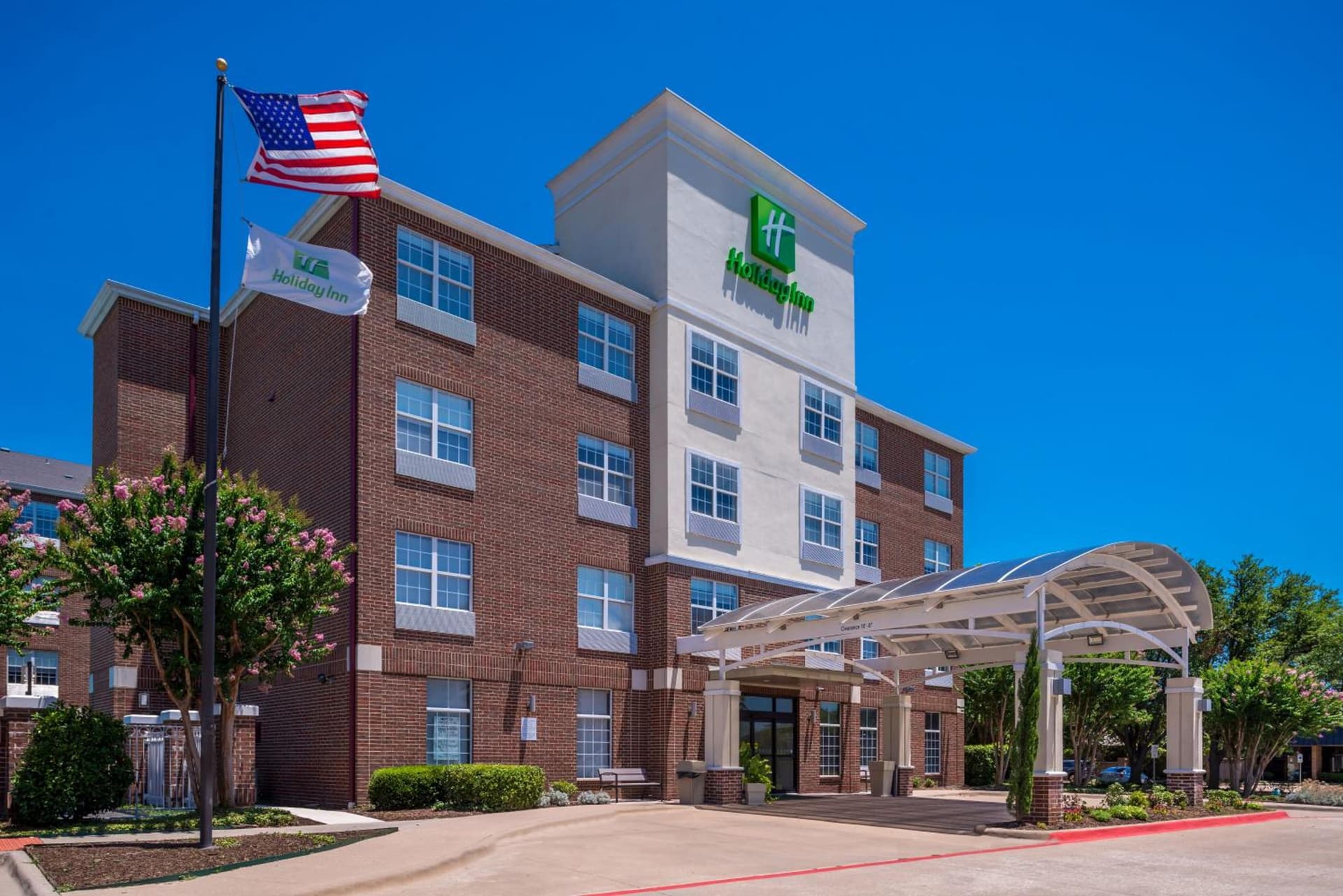 Holiday Inn and Suites Addison by IHG featured exterior or lobby in Addison, TX — similar hotel