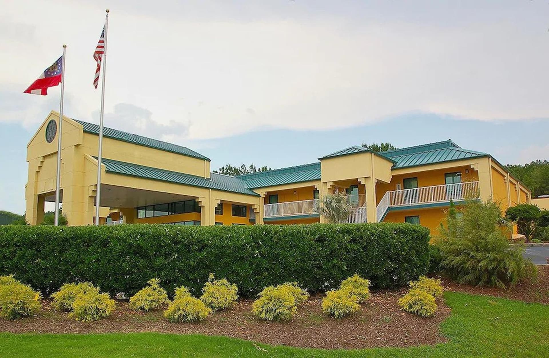 Welcome Inn featured exterior or lobby in Milledgeville, GA — similar hotel