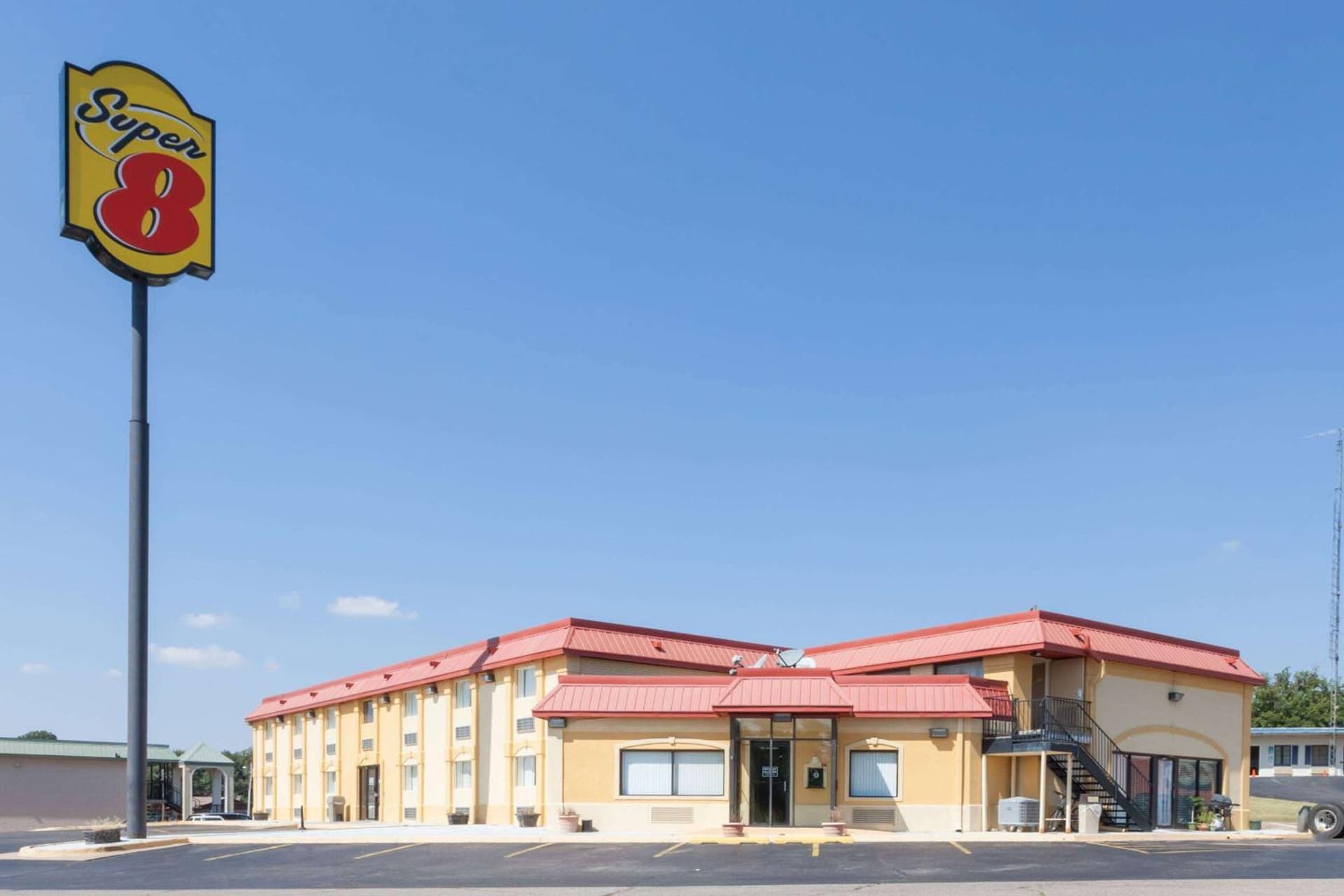 Super 8 by Wyndham Clinton featured exterior or lobby in Clinton, OK — similar hotel