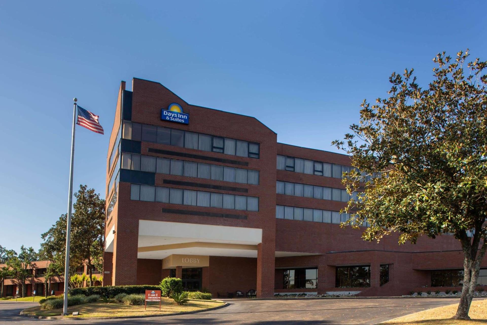 Days Inn & Suites by Wyndham Tallahassee Conf Center I-10 featured exterior or lobby in Tallahassee, FL — similar hotel