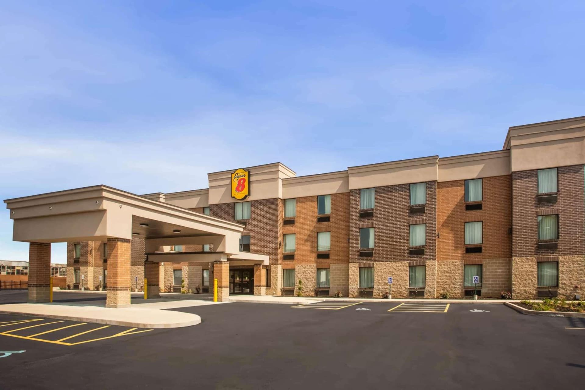 Super 8 by Wyndham St. Louis North featured exterior or lobby in Saint Louis, MO — similar hotel