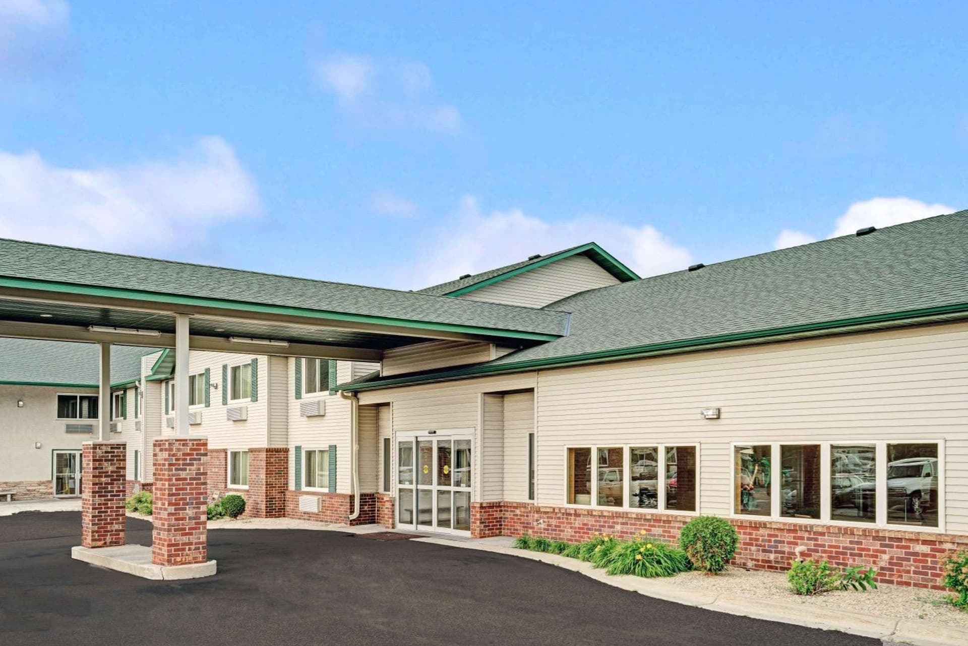 Super 8 by Wyndham Rogers Minnesota featured exterior or lobby in Rogers, MN — similar hotel