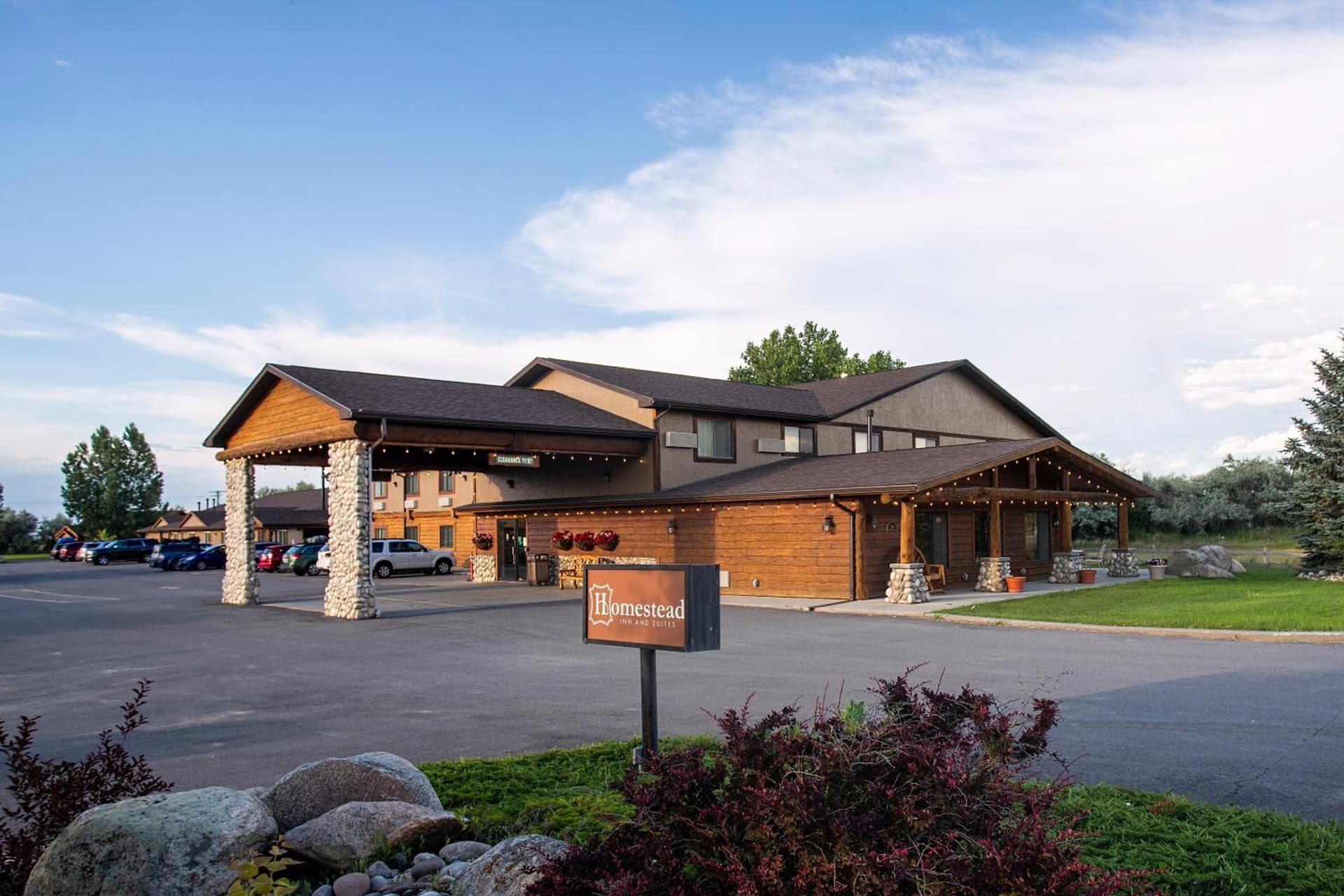 Homestead Inn and Suites featured exterior or lobby in Hardin, MT — similar hotel